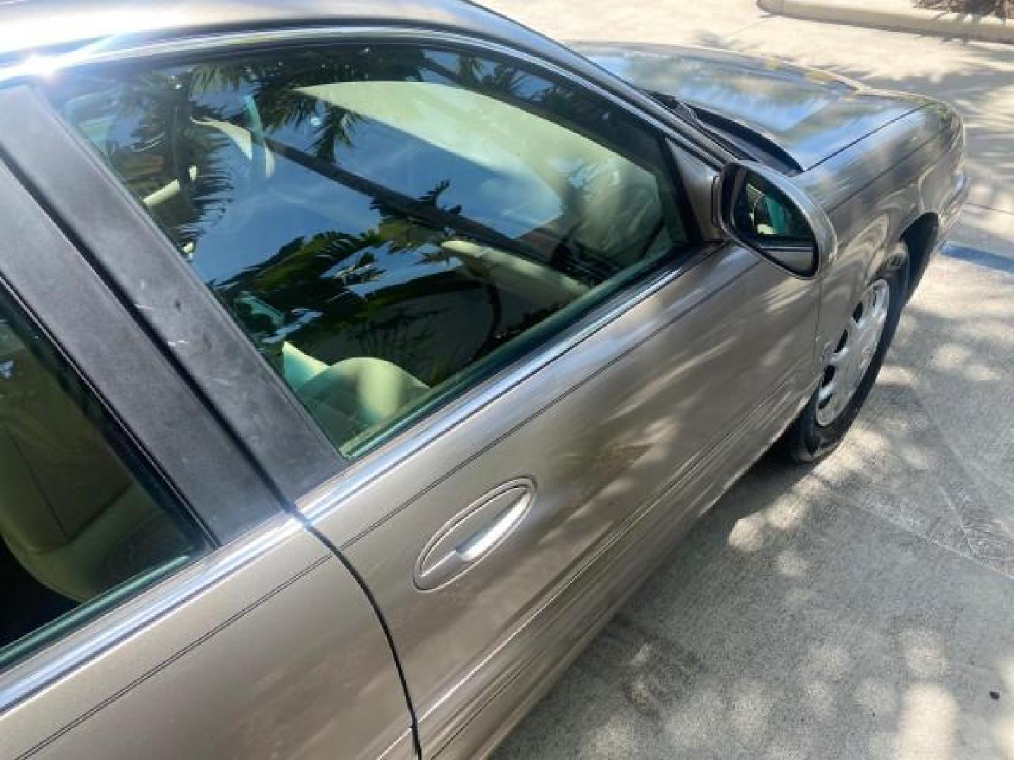 2004 Light Bronzemist Metallic /Cashmere Buick LeSabre Custom LOW MILES 33,563 (1G4HP54K744) with an 3.8L 3800 V6 SFI Engine engine, Automatic transmission, located at 4701 North Dixie Hwy, Pompano Beach, FL, 33064, (954) 422-2889, 26.240938, -80.123474 - OUR WEBPAGE FLORIDACARS1.COM HAS OVER 100 PHOTOS AND FREE CARFAX LINK 2004 BUICK LESABRE CUSTOM VIN: 1G4HP54K744143982 1 G 4 H P 5 4 K 7 4 4 1 4 3 9 8 2 SEDAN 4 DR 3.8L V6 F OHV 29 MPG GASOLINE FRONT WHEEL DRIVE Top Features Cloth Seats Basic Features ABS Brakes Automatic Transmission Power Locks Po - Photo#82