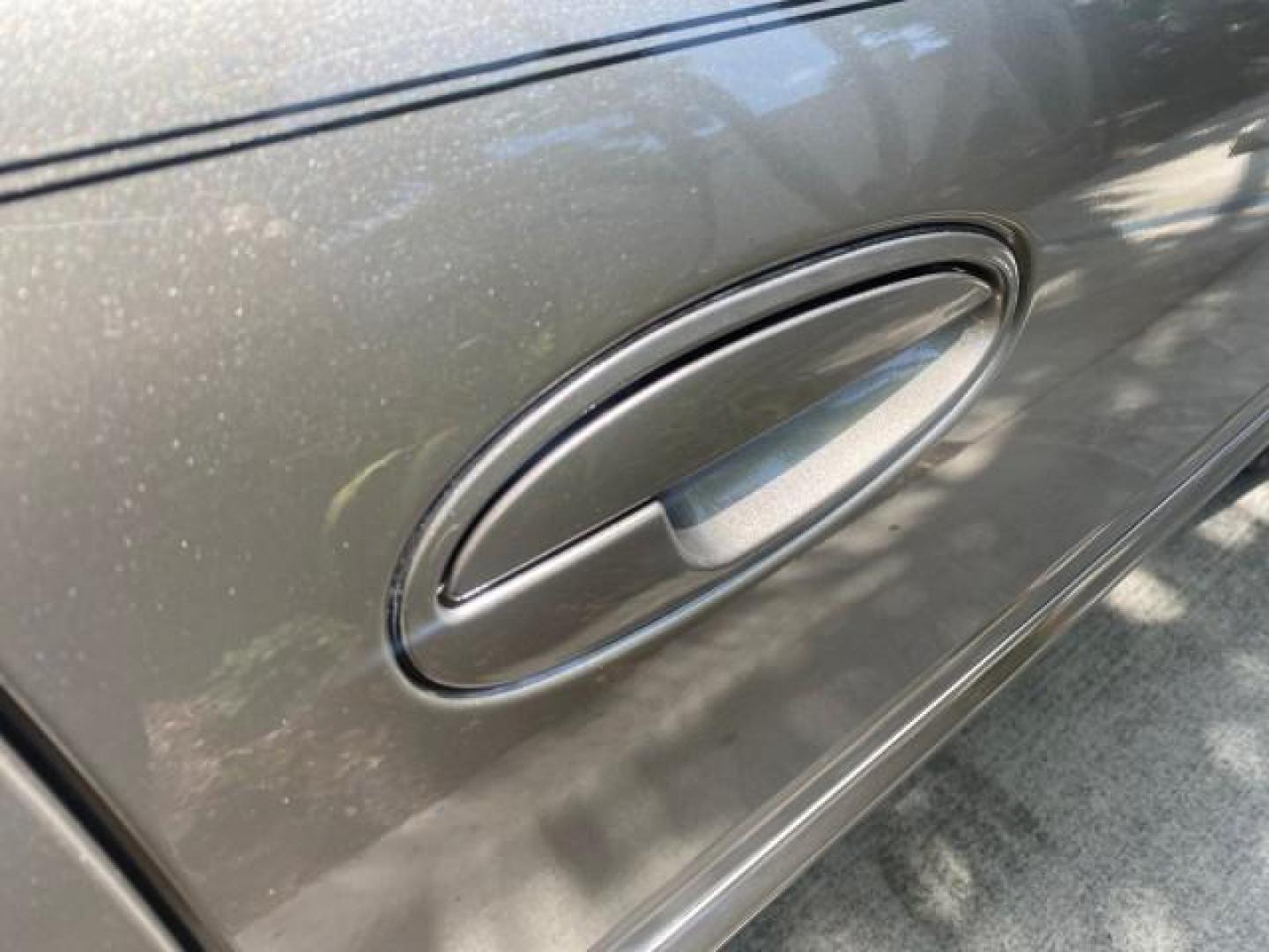 2004 Light Bronzemist Metallic /Cashmere Buick LeSabre Custom LOW MILES 33,563 (1G4HP54K744) with an 3.8L 3800 V6 SFI Engine engine, Automatic transmission, located at 4701 North Dixie Hwy, Pompano Beach, FL, 33064, (954) 422-2889, 26.240938, -80.123474 - OUR WEBPAGE FLORIDACARS1.COM HAS OVER 100 PHOTOS AND FREE CARFAX LINK 2004 BUICK LESABRE CUSTOM VIN: 1G4HP54K744143982 1 G 4 H P 5 4 K 7 4 4 1 4 3 9 8 2 SEDAN 4 DR 3.8L V6 F OHV 29 MPG GASOLINE FRONT WHEEL DRIVE Top Features Cloth Seats Basic Features ABS Brakes Automatic Transmission Power Locks Po - Photo#83