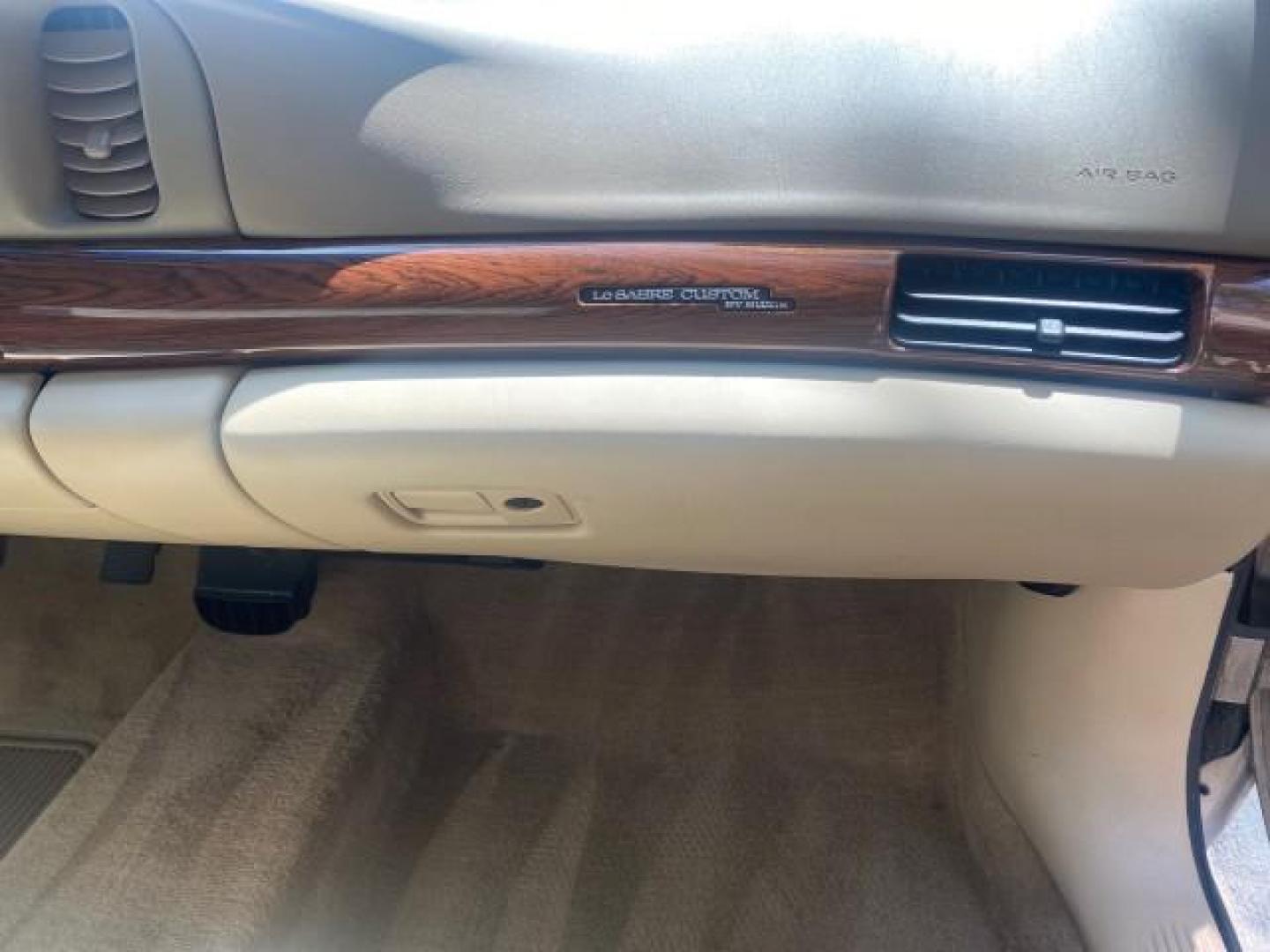 2004 Light Bronzemist Metallic /Cashmere Buick LeSabre Custom LOW MILES 33,563 (1G4HP54K744) with an 3.8L 3800 V6 SFI Engine engine, Automatic transmission, located at 4701 North Dixie Hwy, Pompano Beach, FL, 33064, (954) 422-2889, 26.240938, -80.123474 - OUR WEBPAGE FLORIDACARS1.COM HAS OVER 100 PHOTOS AND FREE CARFAX LINK 2004 BUICK LESABRE CUSTOM VIN: 1G4HP54K744143982 1 G 4 H P 5 4 K 7 4 4 1 4 3 9 8 2 SEDAN 4 DR 3.8L V6 F OHV 29 MPG GASOLINE FRONT WHEEL DRIVE Top Features Cloth Seats Basic Features ABS Brakes Automatic Transmission Power Locks Po - Photo#88