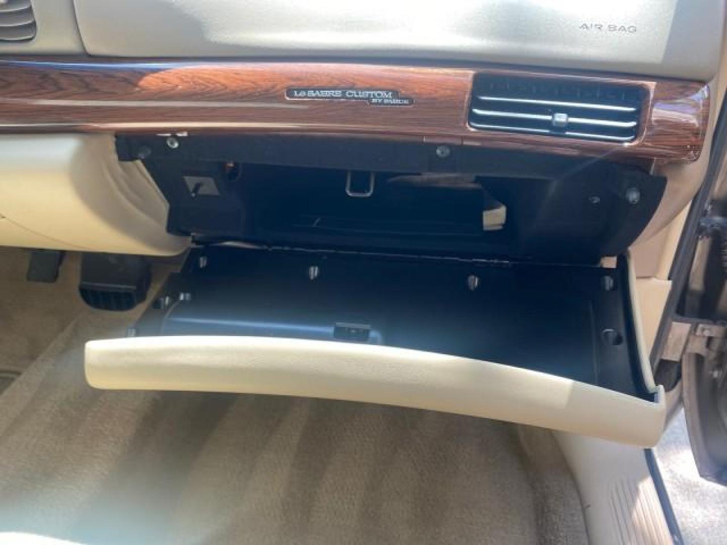 2004 Light Bronzemist Metallic /Cashmere Buick LeSabre Custom LOW MILES 33,563 (1G4HP54K744) with an 3.8L 3800 V6 SFI Engine engine, Automatic transmission, located at 4701 North Dixie Hwy, Pompano Beach, FL, 33064, (954) 422-2889, 26.240938, -80.123474 - OUR WEBPAGE FLORIDACARS1.COM HAS OVER 100 PHOTOS AND FREE CARFAX LINK 2004 BUICK LESABRE CUSTOM VIN: 1G4HP54K744143982 1 G 4 H P 5 4 K 7 4 4 1 4 3 9 8 2 SEDAN 4 DR 3.8L V6 F OHV 29 MPG GASOLINE FRONT WHEEL DRIVE Top Features Cloth Seats Basic Features ABS Brakes Automatic Transmission Power Locks Po - Photo#89