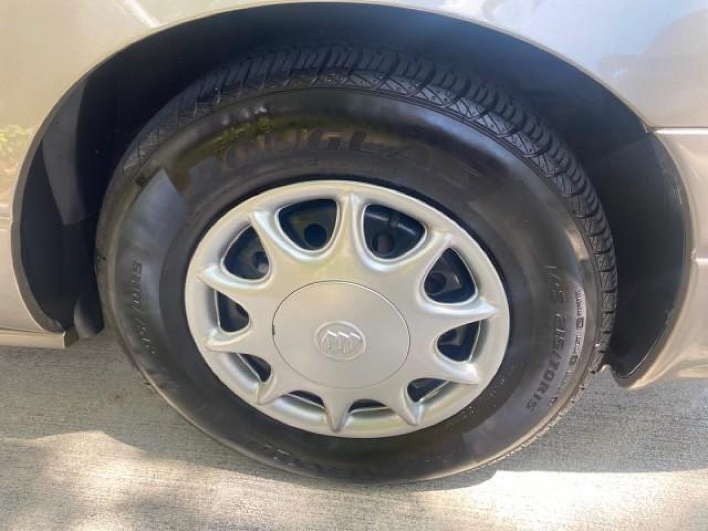 2004 Light Bronzemist Metallic /Cashmere Buick LeSabre Custom LOW MILES 33,563 (1G4HP54K744) with an 3.8L 3800 V6 SFI Engine engine, Automatic transmission, located at 4701 North Dixie Hwy, Pompano Beach, FL, 33064, (954) 422-2889, 26.240938, -80.123474 - OUR WEBPAGE FLORIDACARS1.COM HAS OVER 100 PHOTOS AND FREE CARFAX LINK 2004 BUICK LESABRE CUSTOM VIN: 1G4HP54K744143982 1 G 4 H P 5 4 K 7 4 4 1 4 3 9 8 2 SEDAN 4 DR 3.8L V6 F OHV 29 MPG GASOLINE FRONT WHEEL DRIVE Top Features Cloth Seats Basic Features ABS Brakes Automatic Transmission Power Locks Po - Photo#93