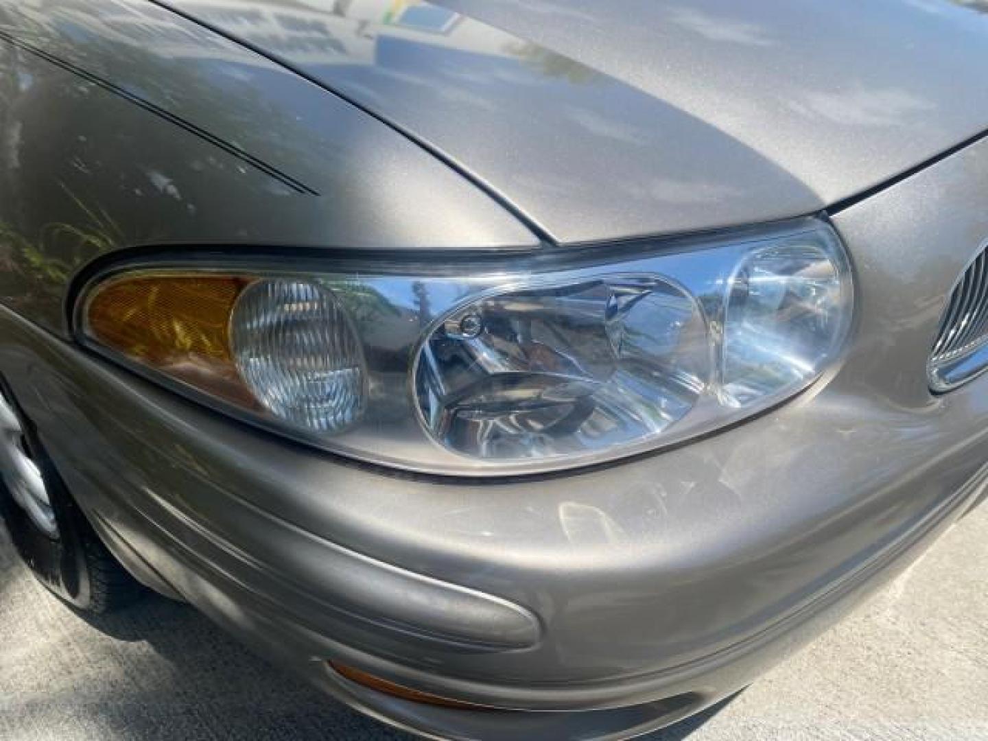 2004 Light Bronzemist Metallic /Cashmere Buick LeSabre Custom LOW MILES 33,563 (1G4HP54K744) with an 3.8L 3800 V6 SFI Engine engine, Automatic transmission, located at 4701 North Dixie Hwy, Pompano Beach, FL, 33064, (954) 422-2889, 26.240938, -80.123474 - OUR WEBPAGE FLORIDACARS1.COM HAS OVER 100 PHOTOS AND FREE CARFAX LINK 2004 BUICK LESABRE CUSTOM VIN: 1G4HP54K744143982 1 G 4 H P 5 4 K 7 4 4 1 4 3 9 8 2 SEDAN 4 DR 3.8L V6 F OHV 29 MPG GASOLINE FRONT WHEEL DRIVE Top Features Cloth Seats Basic Features ABS Brakes Automatic Transmission Power Locks Po - Photo#95