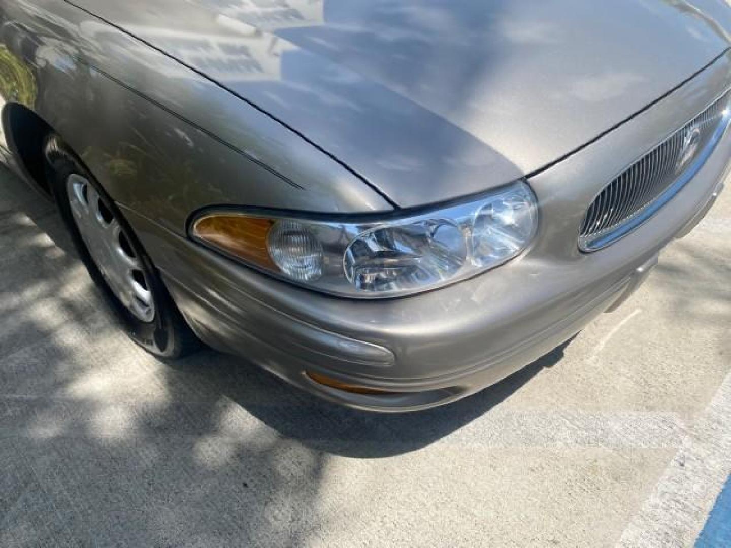 2004 Light Bronzemist Metallic /Cashmere Buick LeSabre Custom LOW MILES 33,563 (1G4HP54K744) with an 3.8L 3800 V6 SFI Engine engine, Automatic transmission, located at 4701 North Dixie Hwy, Pompano Beach, FL, 33064, (954) 422-2889, 26.240938, -80.123474 - OUR WEBPAGE FLORIDACARS1.COM HAS OVER 100 PHOTOS AND FREE CARFAX LINK 2004 BUICK LESABRE CUSTOM VIN: 1G4HP54K744143982 1 G 4 H P 5 4 K 7 4 4 1 4 3 9 8 2 SEDAN 4 DR 3.8L V6 F OHV 29 MPG GASOLINE FRONT WHEEL DRIVE Top Features Cloth Seats Basic Features ABS Brakes Automatic Transmission Power Locks Po - Photo#97