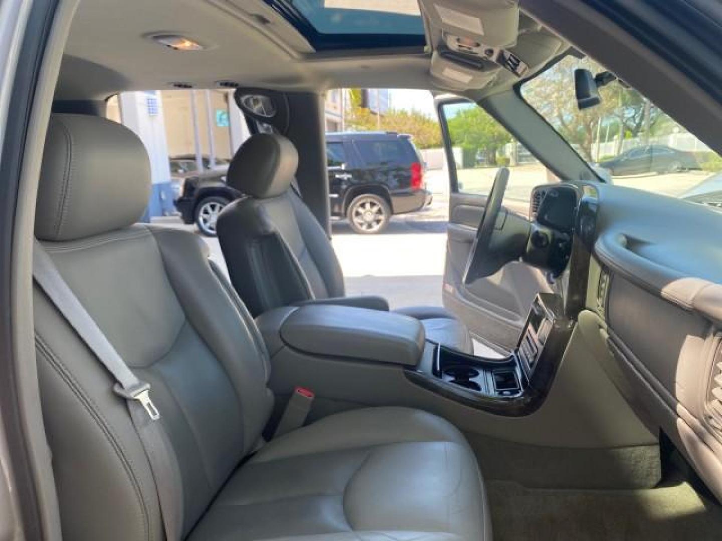 2005 Steel Gray Metallic /Stone Gray GMC Yukon XL Denali AWD LOW MILES 60,526 (1GKFK66U55J) with an 6.0L Vortec 6000 V8 SFI Engine engine, Automatic transmission, located at 4701 North Dixie Hwy, Pompano Beach, FL, 33064, (954) 422-2889, 26.240938, -80.123474 - OUR WEBPAGE FLORIDACARS1.COM HAS OVER 100 PHOTOS AND FREE CARFAX LINK 2005 GMC YUKON XL DENALI VIN: 1GKFK66U55J166568 1 G K F K 6 6 U 5 5 J 1 6 6 5 6 8 4 DOOR WAGON/SPORT UTILITY 6.0L V8 F GASOLINE ALL WHEEL DRIVE Top Features 4WD/AWD Rear Air Conditioning Alloy Wheels Rear Seat Heaters BOSE Sound S - Photo#12