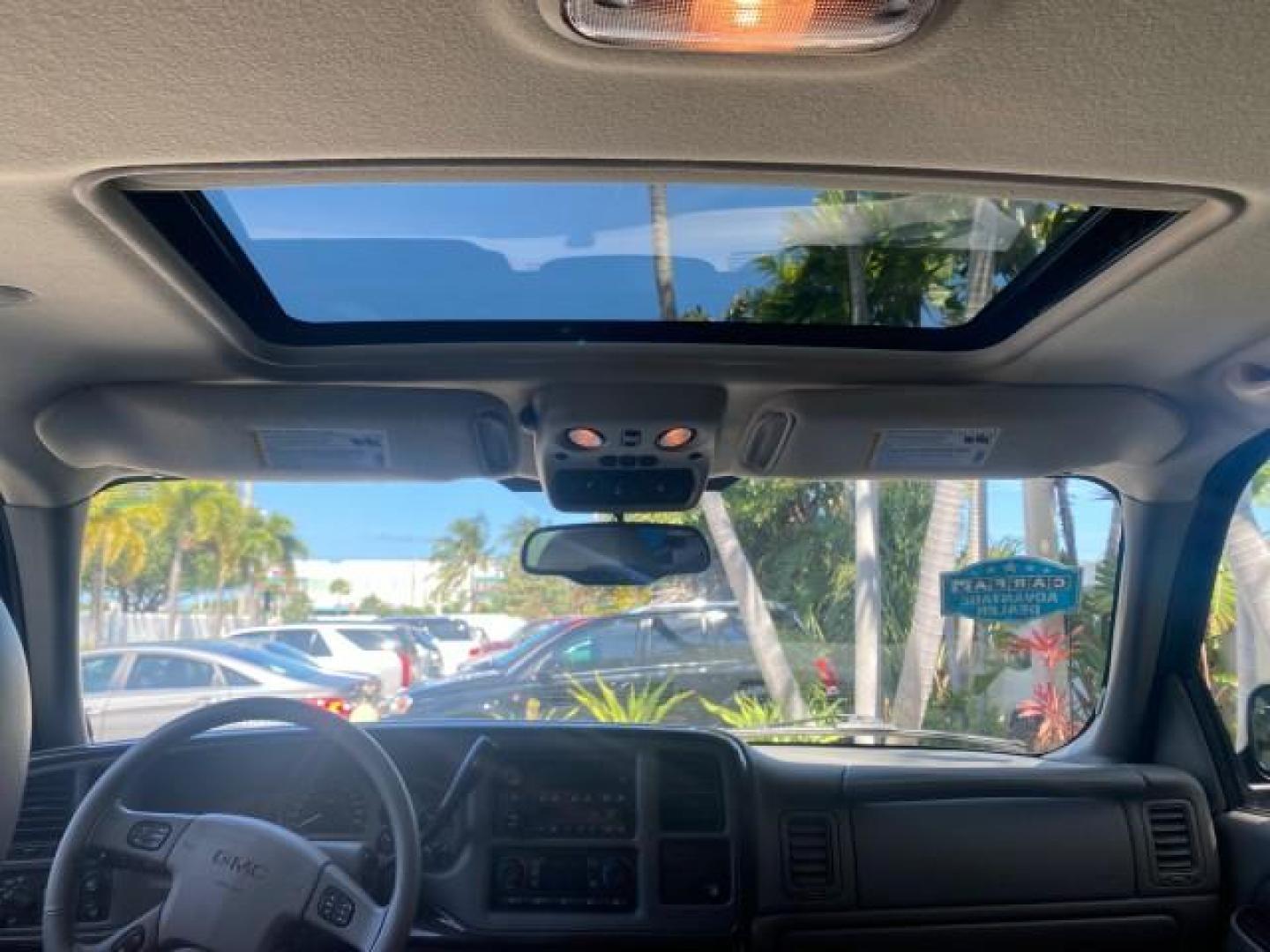 2005 Steel Gray Metallic /Stone Gray GMC Yukon XL Denali AWD LOW MILES 60,526 (1GKFK66U55J) with an 6.0L Vortec 6000 V8 SFI Engine engine, Automatic transmission, located at 4701 North Dixie Hwy, Pompano Beach, FL, 33064, (954) 422-2889, 26.240938, -80.123474 - OUR WEBPAGE FLORIDACARS1.COM HAS OVER 100 PHOTOS AND FREE CARFAX LINK 2005 GMC YUKON XL DENALI VIN: 1GKFK66U55J166568 1 G K F K 6 6 U 5 5 J 1 6 6 5 6 8 4 DOOR WAGON/SPORT UTILITY 6.0L V8 F GASOLINE ALL WHEEL DRIVE Top Features 4WD/AWD Rear Air Conditioning Alloy Wheels Rear Seat Heaters BOSE Sound S - Photo#70