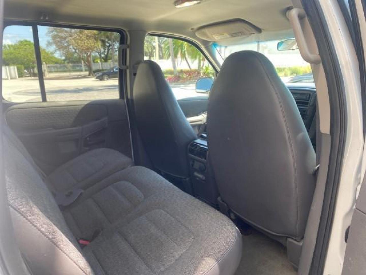 2002 Oxford White /Graphite Ford Explorer XLS FL RUNS LIKE NEW (1FMZU62E22U) with an 4.0L SOHC SEFI V6 Engine engine, Automatic transmission, located at 4701 North Dixie Hwy, Pompano Beach, FL, 33064, (954) 422-2889, 26.240938, -80.123474 - OUR WEBPAGE FLORIDACARS1.COM HAS OVER 100 PHOTOS AND FREE CARFAX LINK 2002 FORD EXPLORER XLS VIN: 1FMZU62E22UA45584 1 F M Z U 6 2 E 2 2 U A 4 5 5 8 4 4 DOOR WAGON/SPORT UTILITY 4.0L V6 F SOHC GASOLINE REAR WHEEL DRIVE Highlighted Features Full Roof Rack Tow Hitch CD Audio Power Windows Power Locks A - Photo#80