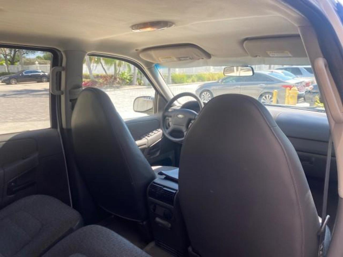2002 Oxford White /Graphite Ford Explorer XLS FL RUNS LIKE NEW (1FMZU62E22U) with an 4.0L SOHC SEFI V6 Engine engine, Automatic transmission, located at 4701 North Dixie Hwy, Pompano Beach, FL, 33064, (954) 422-2889, 26.240938, -80.123474 - OUR WEBPAGE FLORIDACARS1.COM HAS OVER 100 PHOTOS AND FREE CARFAX LINK 2002 FORD EXPLORER XLS VIN: 1FMZU62E22UA45584 1 F M Z U 6 2 E 2 2 U A 4 5 5 8 4 4 DOOR WAGON/SPORT UTILITY 4.0L V6 F SOHC GASOLINE REAR WHEEL DRIVE Highlighted Features Full Roof Rack Tow Hitch CD Audio Power Windows Power Locks A - Photo#82