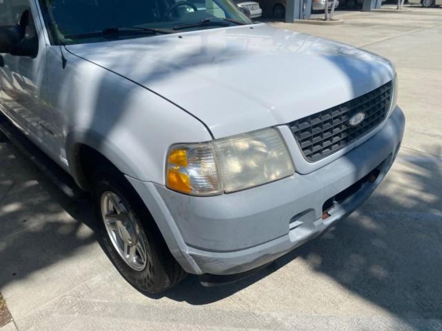 2002 Oxford White /Graphite Ford Explorer XLS FL RUNS LIKE NEW (1FMZU62E22U) with an 4.0L SOHC SEFI V6 Engine engine, Automatic transmission, located at 4701 North Dixie Hwy, Pompano Beach, FL, 33064, (954) 422-2889, 26.240938, -80.123474 - OUR WEBPAGE FLORIDACARS1.COM HAS OVER 100 PHOTOS AND FREE CARFAX LINK 2002 FORD EXPLORER XLS VIN: 1FMZU62E22UA45584 1 F M Z U 6 2 E 2 2 U A 4 5 5 8 4 4 DOOR WAGON/SPORT UTILITY 4.0L V6 F SOHC GASOLINE REAR WHEEL DRIVE Highlighted Features Full Roof Rack Tow Hitch CD Audio Power Windows Power Locks A - Photo#99