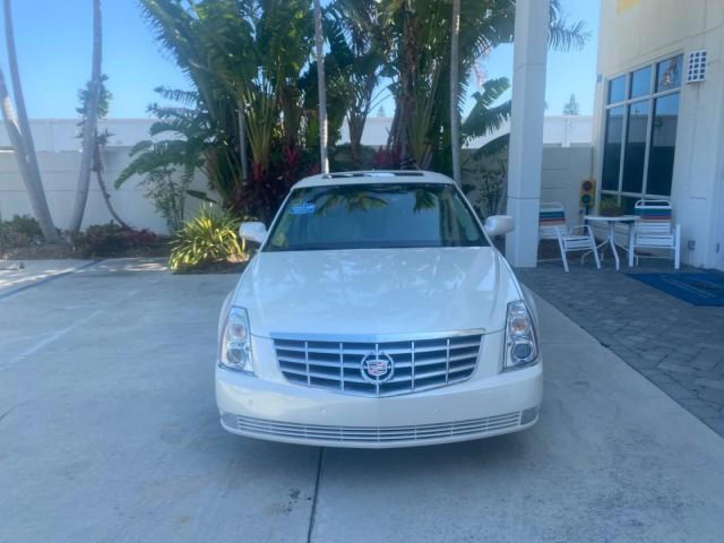 2010 White Diamond Tricoat /Shale/Cocoa Cadillac DTS w/1SC LOW MILES 55,831 FLORIDA (1G6KD5EY9AU) with an Northstar 4.6L DOHC V8 Engine engine, Automatic transmission, located at 4701 North Dixie Hwy, Pompano Beach, FL, 33064, (954) 422-2889, 26.240938, -80.123474 - OUR WEBPAGE FLORIDACARS1.COM HAS OVER 100 PHOTOS AND FREE CARFAX LINK 2010 CADILLAC DTS LUXURY COLLECTION SUNROOF BEAUTIFUL CABRIO VINAL TOP LIKE NEW! ADD $ 5000 PKG! VIN: 1G6KD5EY9AU131997 1 G 6 K D 5 E Y 9 A U 1 3 1 9 9 7 SEDAN 4 DR 4.6L V8 F DOHC 32V GASOLINE FRONT WHEEL DRIVE Top Features A/C Se - Photo#2