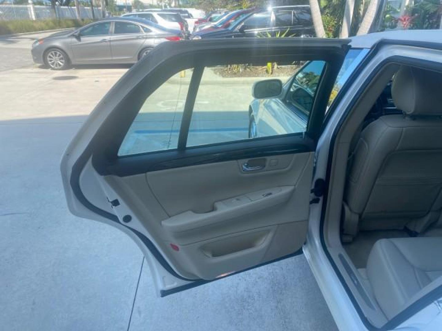 2010 White Diamond Tricoat /Shale/Cocoa Cadillac DTS w/1SC LOW MILES 55,831 FLORIDA (1G6KD5EY9AU) with an Northstar 4.6L DOHC V8 Engine engine, Automatic transmission, located at 4701 North Dixie Hwy, Pompano Beach, FL, 33064, (954) 422-2889, 26.240938, -80.123474 - OUR WEBPAGE FLORIDACARS1.COM HAS OVER 100 PHOTOS AND FREE CARFAX LINK 2010 CADILLAC DTS LUXURY COLLECTION SUNROOF BEAUTIFUL CABRIO VINAL TOP LIKE NEW! ADD $ 5000 PKG! VIN: 1G6KD5EY9AU131997 1 G 6 K D 5 E Y 9 A U 1 3 1 9 9 7 SEDAN 4 DR 4.6L V8 F DOHC 32V GASOLINE FRONT WHEEL DRIVE Top Features A/C Se - Photo#13