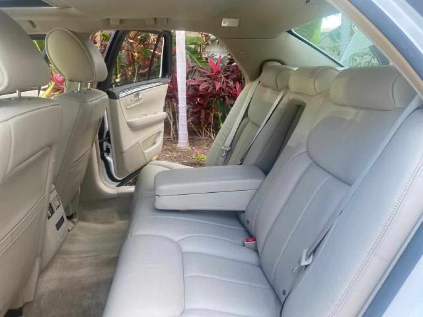 2010 White Diamond Tricoat /Shale/Cocoa Cadillac DTS w/1SC LOW MILES 55,831 FLORIDA (1G6KD5EY9AU) with an Northstar 4.6L DOHC V8 Engine engine, Automatic transmission, located at 4701 North Dixie Hwy, Pompano Beach, FL, 33064, (954) 422-2889, 26.240938, -80.123474 - OUR WEBPAGE FLORIDACARS1.COM HAS OVER 100 PHOTOS AND FREE CARFAX LINK 2010 CADILLAC DTS LUXURY COLLECTION SUNROOF BEAUTIFUL CABRIO VINAL TOP LIKE NEW! ADD $ 5000 PKG! VIN: 1G6KD5EY9AU131997 1 G 6 K D 5 E Y 9 A U 1 3 1 9 9 7 SEDAN 4 DR 4.6L V8 F DOHC 32V GASOLINE FRONT WHEEL DRIVE Top Features A/C Se - Photo#14