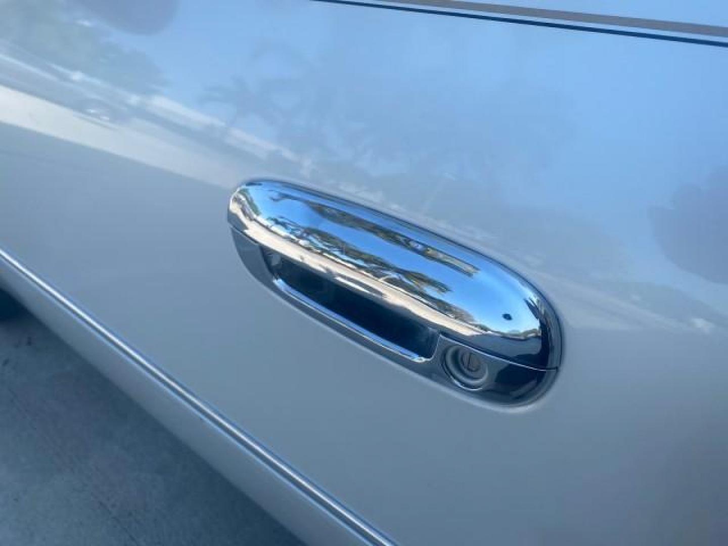2010 White Diamond Tricoat /Shale/Cocoa Cadillac DTS w/1SC LOW MILES 55,831 FLORIDA (1G6KD5EY9AU) with an Northstar 4.6L DOHC V8 Engine engine, Automatic transmission, located at 4701 North Dixie Hwy, Pompano Beach, FL, 33064, (954) 422-2889, 26.240938, -80.123474 - OUR WEBPAGE FLORIDACARS1.COM HAS OVER 100 PHOTOS AND FREE CARFAX LINK 2010 CADILLAC DTS LUXURY COLLECTION SUNROOF BEAUTIFUL CABRIO VINAL TOP LIKE NEW! ADD $ 5000 PKG! VIN: 1G6KD5EY9AU131997 1 G 6 K D 5 E Y 9 A U 1 3 1 9 9 7 SEDAN 4 DR 4.6L V8 F DOHC 32V GASOLINE FRONT WHEEL DRIVE Top Features A/C Se - Photo#28
