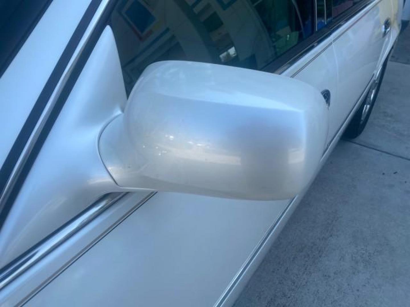 2010 White Diamond Tricoat /Shale/Cocoa Cadillac DTS w/1SC LOW MILES 55,831 FLORIDA (1G6KD5EY9AU) with an Northstar 4.6L DOHC V8 Engine engine, Automatic transmission, located at 4701 North Dixie Hwy, Pompano Beach, FL, 33064, (954) 422-2889, 26.240938, -80.123474 - OUR WEBPAGE FLORIDACARS1.COM HAS OVER 100 PHOTOS AND FREE CARFAX LINK 2010 CADILLAC DTS LUXURY COLLECTION SUNROOF BEAUTIFUL CABRIO VINAL TOP LIKE NEW! ADD $ 5000 PKG! VIN: 1G6KD5EY9AU131997 1 G 6 K D 5 E Y 9 A U 1 3 1 9 9 7 SEDAN 4 DR 4.6L V8 F DOHC 32V GASOLINE FRONT WHEEL DRIVE Top Features A/C Se - Photo#30