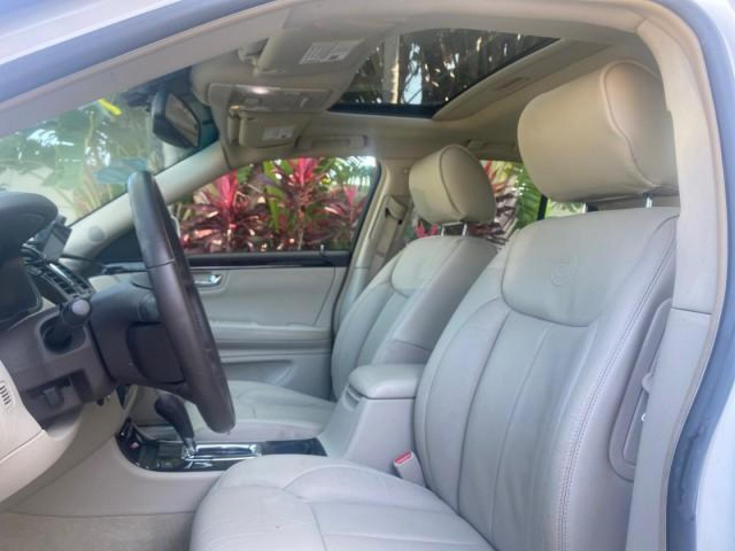 2010 White Diamond Tricoat /Shale/Cocoa Cadillac DTS w/1SC LOW MILES 55,831 FLORIDA (1G6KD5EY9AU) with an Northstar 4.6L DOHC V8 Engine engine, Automatic transmission, located at 4701 North Dixie Hwy, Pompano Beach, FL, 33064, (954) 422-2889, 26.240938, -80.123474 - OUR WEBPAGE FLORIDACARS1.COM HAS OVER 100 PHOTOS AND FREE CARFAX LINK 2010 CADILLAC DTS LUXURY COLLECTION SUNROOF BEAUTIFUL CABRIO VINAL TOP LIKE NEW! ADD $ 5000 PKG! VIN: 1G6KD5EY9AU131997 1 G 6 K D 5 E Y 9 A U 1 3 1 9 9 7 SEDAN 4 DR 4.6L V8 F DOHC 32V GASOLINE FRONT WHEEL DRIVE Top Features A/C Se - Photo#33