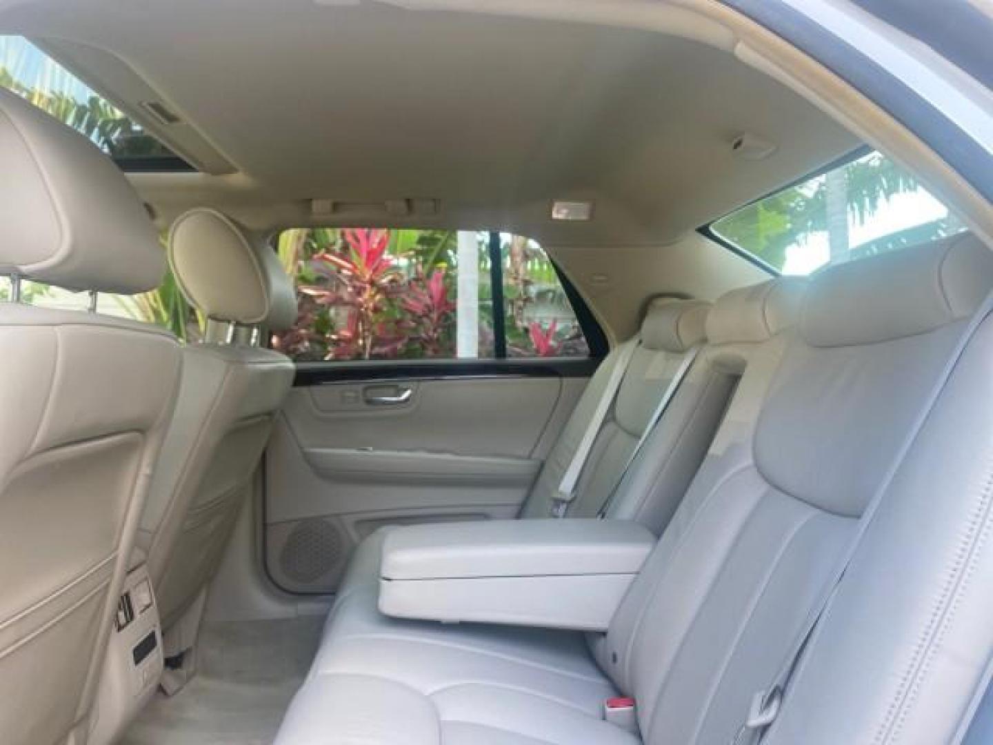 2010 White Diamond Tricoat /Shale/Cocoa Cadillac DTS w/1SC LOW MILES 55,831 FLORIDA (1G6KD5EY9AU) with an Northstar 4.6L DOHC V8 Engine engine, Automatic transmission, located at 4701 North Dixie Hwy, Pompano Beach, FL, 33064, (954) 422-2889, 26.240938, -80.123474 - OUR WEBPAGE FLORIDACARS1.COM HAS OVER 100 PHOTOS AND FREE CARFAX LINK 2010 CADILLAC DTS LUXURY COLLECTION SUNROOF BEAUTIFUL CABRIO VINAL TOP LIKE NEW! ADD $ 5000 PKG! VIN: 1G6KD5EY9AU131997 1 G 6 K D 5 E Y 9 A U 1 3 1 9 9 7 SEDAN 4 DR 4.6L V8 F DOHC 32V GASOLINE FRONT WHEEL DRIVE Top Features A/C Se - Photo#63