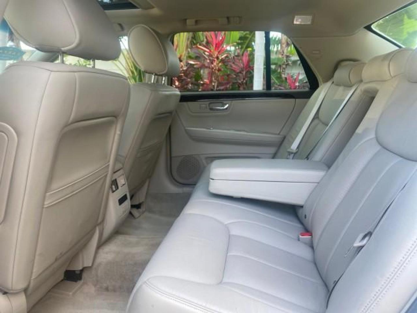 2010 White Diamond Tricoat /Shale/Cocoa Cadillac DTS w/1SC LOW MILES 55,831 FLORIDA (1G6KD5EY9AU) with an Northstar 4.6L DOHC V8 Engine engine, Automatic transmission, located at 4701 North Dixie Hwy, Pompano Beach, FL, 33064, (954) 422-2889, 26.240938, -80.123474 - OUR WEBPAGE FLORIDACARS1.COM HAS OVER 100 PHOTOS AND FREE CARFAX LINK 2010 CADILLAC DTS LUXURY COLLECTION SUNROOF BEAUTIFUL CABRIO VINAL TOP LIKE NEW! ADD $ 5000 PKG! VIN: 1G6KD5EY9AU131997 1 G 6 K D 5 E Y 9 A U 1 3 1 9 9 7 SEDAN 4 DR 4.6L V8 F DOHC 32V GASOLINE FRONT WHEEL DRIVE Top Features A/C Se - Photo#64
