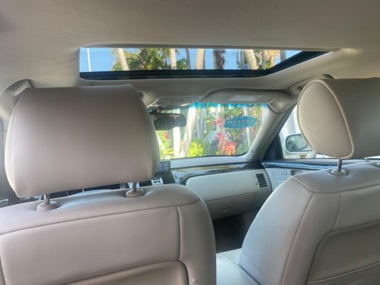 2010 White Diamond Tricoat /Shale/Cocoa Cadillac DTS w/1SC LOW MILES 55,831 FLORIDA (1G6KD5EY9AU) with an Northstar 4.6L DOHC V8 Engine engine, Automatic transmission, located at 4701 North Dixie Hwy, Pompano Beach, FL, 33064, (954) 422-2889, 26.240938, -80.123474 - OUR WEBPAGE FLORIDACARS1.COM HAS OVER 100 PHOTOS AND FREE CARFAX LINK 2010 CADILLAC DTS LUXURY COLLECTION SUNROOF BEAUTIFUL CABRIO VINAL TOP LIKE NEW! ADD $ 5000 PKG! VIN: 1G6KD5EY9AU131997 1 G 6 K D 5 E Y 9 A U 1 3 1 9 9 7 SEDAN 4 DR 4.6L V8 F DOHC 32V GASOLINE FRONT WHEEL DRIVE Top Features A/C Se - Photo#66