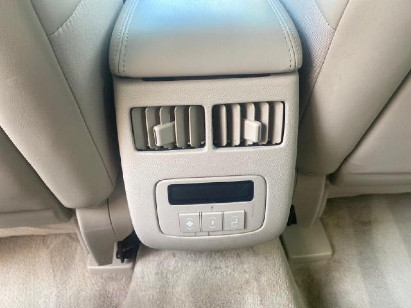 2010 White Diamond Tricoat /Shale/Cocoa Cadillac DTS w/1SC LOW MILES 55,831 FLORIDA (1G6KD5EY9AU) with an Northstar 4.6L DOHC V8 Engine engine, Automatic transmission, located at 4701 North Dixie Hwy, Pompano Beach, FL, 33064, (954) 422-2889, 26.240938, -80.123474 - OUR WEBPAGE FLORIDACARS1.COM HAS OVER 100 PHOTOS AND FREE CARFAX LINK 2010 CADILLAC DTS LUXURY COLLECTION SUNROOF BEAUTIFUL CABRIO VINAL TOP LIKE NEW! ADD $ 5000 PKG! VIN: 1G6KD5EY9AU131997 1 G 6 K D 5 E Y 9 A U 1 3 1 9 9 7 SEDAN 4 DR 4.6L V8 F DOHC 32V GASOLINE FRONT WHEEL DRIVE Top Features A/C Se - Photo#67