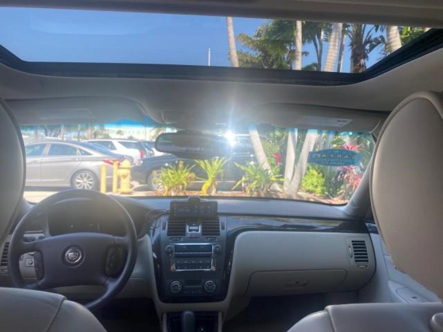 2010 White Diamond Tricoat /Shale/Cocoa Cadillac DTS w/1SC LOW MILES 55,831 FLORIDA (1G6KD5EY9AU) with an Northstar 4.6L DOHC V8 Engine engine, Automatic transmission, located at 4701 North Dixie Hwy, Pompano Beach, FL, 33064, (954) 422-2889, 26.240938, -80.123474 - OUR WEBPAGE FLORIDACARS1.COM HAS OVER 100 PHOTOS AND FREE CARFAX LINK 2010 CADILLAC DTS LUXURY COLLECTION SUNROOF BEAUTIFUL CABRIO VINAL TOP LIKE NEW! ADD $ 5000 PKG! VIN: 1G6KD5EY9AU131997 1 G 6 K D 5 E Y 9 A U 1 3 1 9 9 7 SEDAN 4 DR 4.6L V8 F DOHC 32V GASOLINE FRONT WHEEL DRIVE Top Features A/C Se - Photo#69