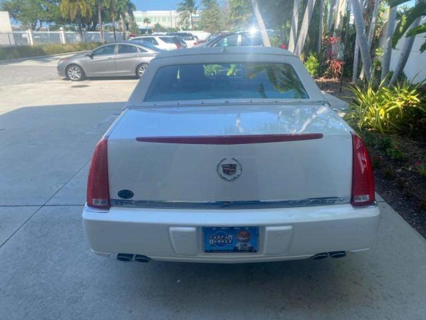 2010 White Diamond Tricoat /Shale/Cocoa Cadillac DTS w/1SC LOW MILES 55,831 FLORIDA (1G6KD5EY9AU) with an Northstar 4.6L DOHC V8 Engine engine, Automatic transmission, located at 4701 North Dixie Hwy, Pompano Beach, FL, 33064, (954) 422-2889, 26.240938, -80.123474 - OUR WEBPAGE FLORIDACARS1.COM HAS OVER 100 PHOTOS AND FREE CARFAX LINK 2010 CADILLAC DTS LUXURY COLLECTION SUNROOF BEAUTIFUL CABRIO VINAL TOP LIKE NEW! ADD $ 5000 PKG! VIN: 1G6KD5EY9AU131997 1 G 6 K D 5 E Y 9 A U 1 3 1 9 9 7 SEDAN 4 DR 4.6L V8 F DOHC 32V GASOLINE FRONT WHEEL DRIVE Top Features A/C Se - Photo#76
