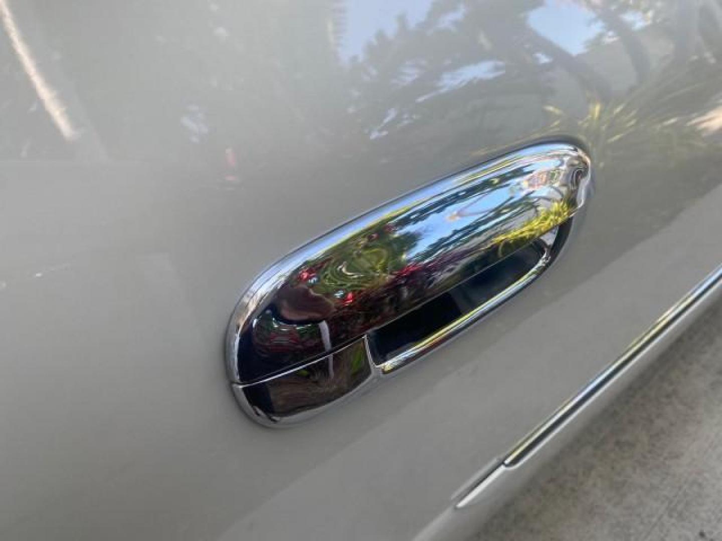 2010 White Diamond Tricoat /Shale/Cocoa Cadillac DTS w/1SC LOW MILES 55,831 FLORIDA (1G6KD5EY9AU) with an Northstar 4.6L DOHC V8 Engine engine, Automatic transmission, located at 4701 North Dixie Hwy, Pompano Beach, FL, 33064, (954) 422-2889, 26.240938, -80.123474 - OUR WEBPAGE FLORIDACARS1.COM HAS OVER 100 PHOTOS AND FREE CARFAX LINK 2010 CADILLAC DTS LUXURY COLLECTION SUNROOF BEAUTIFUL CABRIO VINAL TOP LIKE NEW! ADD $ 5000 PKG! VIN: 1G6KD5EY9AU131997 1 G 6 K D 5 E Y 9 A U 1 3 1 9 9 7 SEDAN 4 DR 4.6L V8 F DOHC 32V GASOLINE FRONT WHEEL DRIVE Top Features A/C Se - Photo#89