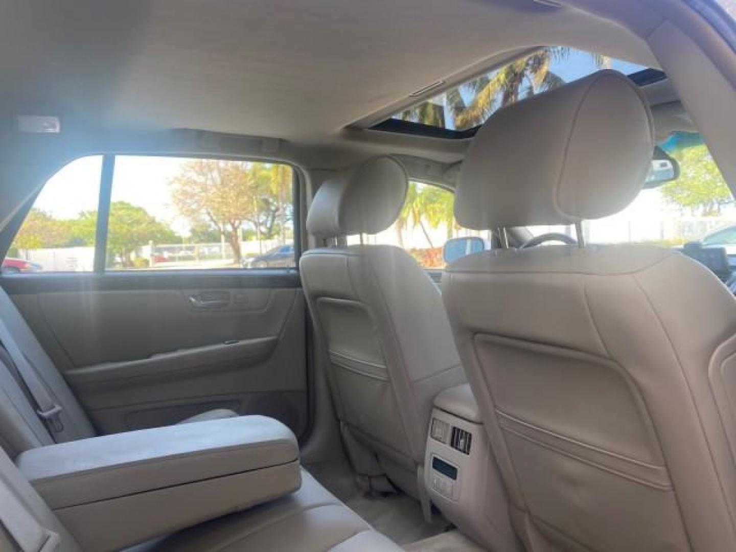 2010 White Diamond Tricoat /Shale/Cocoa Cadillac DTS w/1SC LOW MILES 55,831 FLORIDA (1G6KD5EY9AU) with an Northstar 4.6L DOHC V8 Engine engine, Automatic transmission, located at 4701 North Dixie Hwy, Pompano Beach, FL, 33064, (954) 422-2889, 26.240938, -80.123474 - OUR WEBPAGE FLORIDACARS1.COM HAS OVER 100 PHOTOS AND FREE CARFAX LINK 2010 CADILLAC DTS LUXURY COLLECTION SUNROOF BEAUTIFUL CABRIO VINAL TOP LIKE NEW! ADD $ 5000 PKG! VIN: 1G6KD5EY9AU131997 1 G 6 K D 5 E Y 9 A U 1 3 1 9 9 7 SEDAN 4 DR 4.6L V8 F DOHC 32V GASOLINE FRONT WHEEL DRIVE Top Features A/C Se - Photo#92