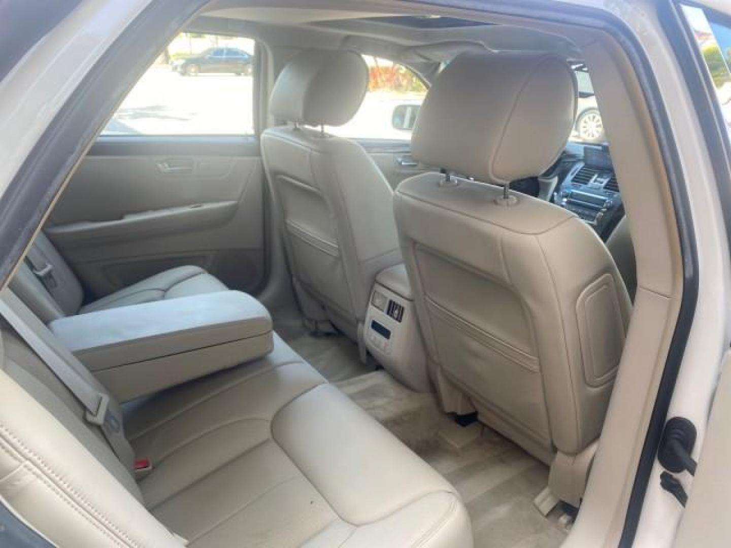 2010 White Diamond Tricoat /Shale/Cocoa Cadillac DTS w/1SC LOW MILES 55,831 FLORIDA (1G6KD5EY9AU) with an Northstar 4.6L DOHC V8 Engine engine, Automatic transmission, located at 4701 North Dixie Hwy, Pompano Beach, FL, 33064, (954) 422-2889, 26.240938, -80.123474 - OUR WEBPAGE FLORIDACARS1.COM HAS OVER 100 PHOTOS AND FREE CARFAX LINK 2010 CADILLAC DTS LUXURY COLLECTION SUNROOF BEAUTIFUL CABRIO VINAL TOP LIKE NEW! ADD $ 5000 PKG! VIN: 1G6KD5EY9AU131997 1 G 6 K D 5 E Y 9 A U 1 3 1 9 9 7 SEDAN 4 DR 4.6L V8 F DOHC 32V GASOLINE FRONT WHEEL DRIVE Top Features A/C Se - Photo#95