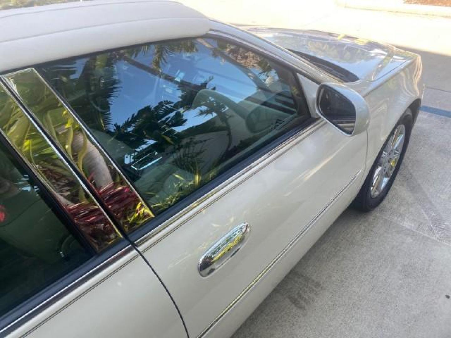 2010 White Diamond Tricoat /Shale/Cocoa Cadillac DTS w/1SC LOW MILES 55,831 FLORIDA (1G6KD5EY9AU) with an Northstar 4.6L DOHC V8 Engine engine, Automatic transmission, located at 4701 North Dixie Hwy, Pompano Beach, FL, 33064, (954) 422-2889, 26.240938, -80.123474 - OUR WEBPAGE FLORIDACARS1.COM HAS OVER 100 PHOTOS AND FREE CARFAX LINK 2010 CADILLAC DTS LUXURY COLLECTION SUNROOF BEAUTIFUL CABRIO VINAL TOP LIKE NEW! ADD $ 5000 PKG! VIN: 1G6KD5EY9AU131997 1 G 6 K D 5 E Y 9 A U 1 3 1 9 9 7 SEDAN 4 DR 4.6L V8 F DOHC 32V GASOLINE FRONT WHEEL DRIVE Top Features A/C Se - Photo#96