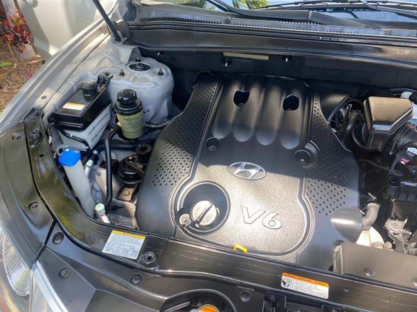 2007 Platinum /Gray Hyundai Santa Fe GLS LOW MILES 37,778 (5NMSG13D77H) with an 2.7L DOHC MPI V6 Engine engine, Automatic transmission, located at 4701 North Dixie Hwy, Pompano Beach, FL, 33064, (954) 422-2889, 26.240938, -80.123474 - OUR WEBPAGE FLORIDACARS1.COM HAS OVER 100 PHOTOS AND FREE CARFAX LINK 2007 HYUNDAI SANTA FE GLS VIN: 5NMSG13D77H123524 5 N M S G 1 3 D 7 7 H 1 2 3 5 2 4 4 DOOR WAGON/SPORT UTILITY 2.7L V6 F DOHC 16V GASOLINE FRONT WHEEL DRIVE Top Features Alloy Wheels Cloth Seats Satellite Radio Ready Basic Features - Photo#25