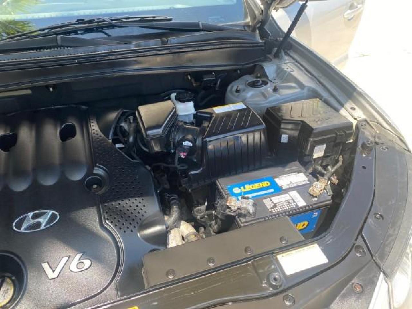 2007 Platinum /Gray Hyundai Santa Fe GLS LOW MILES 37,778 (5NMSG13D77H) with an 2.7L DOHC MPI V6 Engine engine, Automatic transmission, located at 4701 North Dixie Hwy, Pompano Beach, FL, 33064, (954) 422-2889, 26.240938, -80.123474 - OUR WEBPAGE FLORIDACARS1.COM HAS OVER 100 PHOTOS AND FREE CARFAX LINK 2007 HYUNDAI SANTA FE GLS VIN: 5NMSG13D77H123524 5 N M S G 1 3 D 7 7 H 1 2 3 5 2 4 4 DOOR WAGON/SPORT UTILITY 2.7L V6 F DOHC 16V GASOLINE FRONT WHEEL DRIVE Top Features Alloy Wheels Cloth Seats Satellite Radio Ready Basic Features - Photo#26