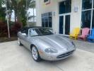 2004 Quartz /Charcoal Jaguar XK8 CONV LOW MILES 22,128 (SAJDA42CX42) with an 4.2L DOHC EFI 32-Valve Aluminum Alloy V8 Engine engine, Automatic transmission, located at 4701 North Dixie Hwy, Pompano Beach, FL, 33064, (954) 422-2889, 26.240938, -80.123474 - OUR WEBPAGE FLORIDACARS1.COM HAS OVER 100 PHOTOS AND FREE CARFAX LINK 2004 JAGUAR XK-SERIES XK8 $ 75,530 NEW VIN: SAJDA42CX42A37634 S A J D A 4 2 C X 4 2 A 3 7 6 3 4 CONVERTIBLE 4.2L V8 F DOHC GASOLINE REAR WHEEL DRIVE TOP WORKS GREAT! TIRES ARE LIKE NEW! Top Features Alloy Wheels Leather Seats Alpi - Photo#1