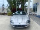 2004 Quartz /Charcoal Jaguar XK8 CONV LOW MILES 22,128 (SAJDA42CX42) with an 4.2L DOHC EFI 32-Valve Aluminum Alloy V8 Engine engine, Automatic transmission, located at 4701 North Dixie Hwy, Pompano Beach, FL, 33064, (954) 422-2889, 26.240938, -80.123474 - OUR WEBPAGE FLORIDACARS1.COM HAS OVER 100 PHOTOS AND FREE CARFAX LINK 2004 JAGUAR XK-SERIES XK8 $ 75,530 NEW VIN: SAJDA42CX42A37634 S A J D A 4 2 C X 4 2 A 3 7 6 3 4 CONVERTIBLE 4.2L V8 F DOHC GASOLINE REAR WHEEL DRIVE TOP WORKS GREAT! TIRES ARE LIKE NEW! Top Features Alloy Wheels Leather Seats Alpi - Photo#2