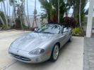 2004 Quartz /Charcoal Jaguar XK8 CONV LOW MILES 22,128 (SAJDA42CX42) with an 4.2L DOHC EFI 32-Valve Aluminum Alloy V8 Engine engine, Automatic transmission, located at 4701 North Dixie Hwy, Pompano Beach, FL, 33064, (954) 422-2889, 26.240938, -80.123474 - OUR WEBPAGE FLORIDACARS1.COM HAS OVER 100 PHOTOS AND FREE CARFAX LINK 2004 JAGUAR XK-SERIES XK8 $ 75,530 NEW VIN: SAJDA42CX42A37634 S A J D A 4 2 C X 4 2 A 3 7 6 3 4 CONVERTIBLE 4.2L V8 F DOHC GASOLINE REAR WHEEL DRIVE TOP WORKS GREAT! TIRES ARE LIKE NEW! Top Features Alloy Wheels Leather Seats Alpi - Photo#3