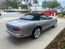 2004 Quartz /Charcoal Jaguar XK8 CONV LOW MILES 22,128 (SAJDA42CX42) with an 4.2L DOHC EFI 32-Valve Aluminum Alloy V8 Engine engine, Automatic transmission, located at 4701 North Dixie Hwy, Pompano Beach, FL, 33064, (954) 422-2889, 26.240938, -80.123474 - OUR WEBPAGE FLORIDACARS1.COM HAS OVER 100 PHOTOS AND FREE CARFAX LINK 2004 JAGUAR XK-SERIES XK8 $ 75,530 NEW VIN: SAJDA42CX42A37634 S A J D A 4 2 C X 4 2 A 3 7 6 3 4 CONVERTIBLE 4.2L V8 F DOHC GASOLINE REAR WHEEL DRIVE TOP WORKS GREAT! TIRES ARE LIKE NEW! Top Features Alloy Wheels Leather Seats Alpi - Photo#7