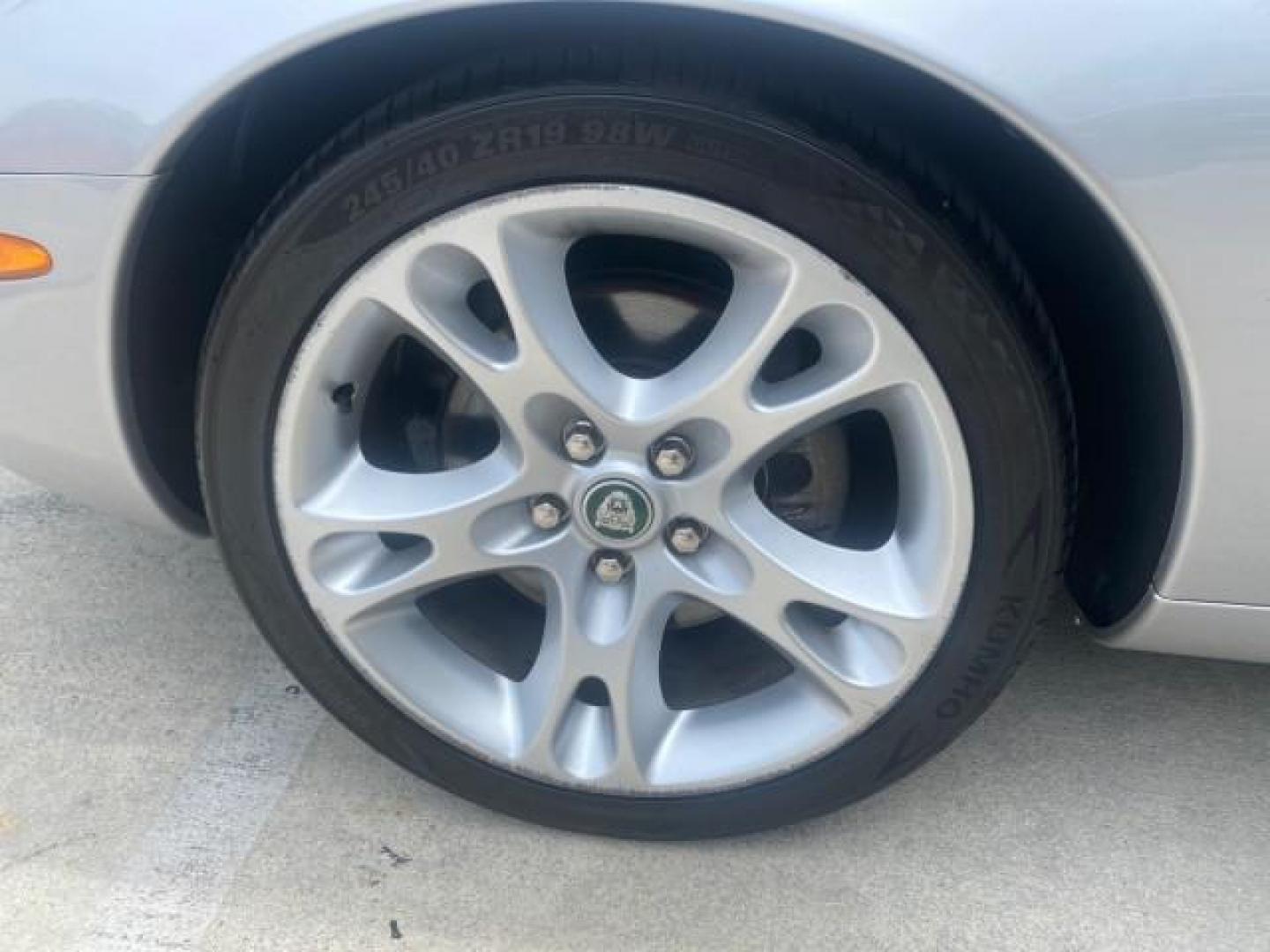 2004 Quartz /Charcoal Jaguar XK8 CONV LOW MILES 22,128 (SAJDA42CX42) with an 4.2L DOHC EFI 32-Valve Aluminum Alloy V8 Engine engine, Automatic transmission, located at 4701 North Dixie Hwy, Pompano Beach, FL, 33064, (954) 422-2889, 26.240938, -80.123474 - OUR WEBPAGE FLORIDACARS1.COM HAS OVER 100 PHOTOS AND FREE CARFAX LINK 2004 JAGUAR XK-SERIES XK8 $ 75,530 NEW VIN: SAJDA42CX42A37634 S A J D A 4 2 C X 4 2 A 3 7 6 3 4 CONVERTIBLE 4.2L V8 F DOHC GASOLINE REAR WHEEL DRIVE TOP WORKS GREAT! TIRES ARE LIKE NEW! Top Features Alloy Wheels Leather Seats Alpi - Photo#19