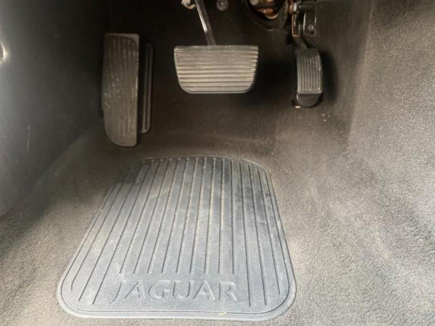 2004 Quartz /Charcoal Jaguar XK8 CONV LOW MILES 22,128 (SAJDA42CX42) with an 4.2L DOHC EFI 32-Valve Aluminum Alloy V8 Engine engine, Automatic transmission, located at 4701 North Dixie Hwy, Pompano Beach, FL, 33064, (954) 422-2889, 26.240938, -80.123474 - OUR WEBPAGE FLORIDACARS1.COM HAS OVER 100 PHOTOS AND FREE CARFAX LINK 2004 JAGUAR XK-SERIES XK8 $ 75,530 NEW VIN: SAJDA42CX42A37634 S A J D A 4 2 C X 4 2 A 3 7 6 3 4 CONVERTIBLE 4.2L V8 F DOHC GASOLINE REAR WHEEL DRIVE TOP WORKS GREAT! TIRES ARE LIKE NEW! Top Features Alloy Wheels Leather Seats Alpi - Photo#49