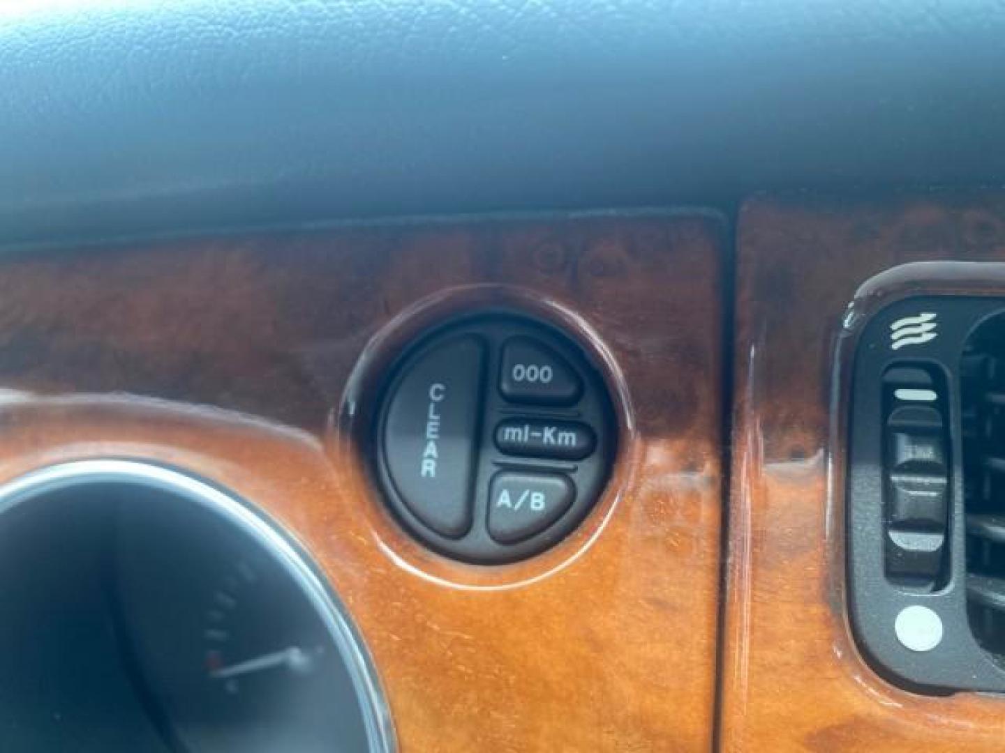2004 Quartz /Charcoal Jaguar XK8 CONV LOW MILES 22,128 (SAJDA42CX42) with an 4.2L DOHC EFI 32-Valve Aluminum Alloy V8 Engine engine, Automatic transmission, located at 4701 North Dixie Hwy, Pompano Beach, FL, 33064, (954) 422-2889, 26.240938, -80.123474 - OUR WEBPAGE FLORIDACARS1.COM HAS OVER 100 PHOTOS AND FREE CARFAX LINK 2004 JAGUAR XK-SERIES XK8 $ 75,530 NEW VIN: SAJDA42CX42A37634 S A J D A 4 2 C X 4 2 A 3 7 6 3 4 CONVERTIBLE 4.2L V8 F DOHC GASOLINE REAR WHEEL DRIVE TOP WORKS GREAT! TIRES ARE LIKE NEW! Top Features Alloy Wheels Leather Seats Alpi - Photo#50