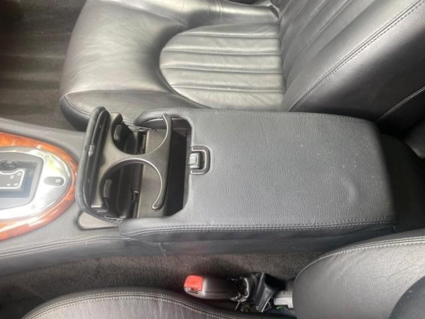 2004 Quartz /Charcoal Jaguar XK8 CONV LOW MILES 22,128 (SAJDA42CX42) with an 4.2L DOHC EFI 32-Valve Aluminum Alloy V8 Engine engine, Automatic transmission, located at 4701 North Dixie Hwy, Pompano Beach, FL, 33064, (954) 422-2889, 26.240938, -80.123474 - OUR WEBPAGE FLORIDACARS1.COM HAS OVER 100 PHOTOS AND FREE CARFAX LINK 2004 JAGUAR XK-SERIES XK8 $ 75,530 NEW VIN: SAJDA42CX42A37634 S A J D A 4 2 C X 4 2 A 3 7 6 3 4 CONVERTIBLE 4.2L V8 F DOHC GASOLINE REAR WHEEL DRIVE TOP WORKS GREAT! TIRES ARE LIKE NEW! Top Features Alloy Wheels Leather Seats Alpi - Photo#56