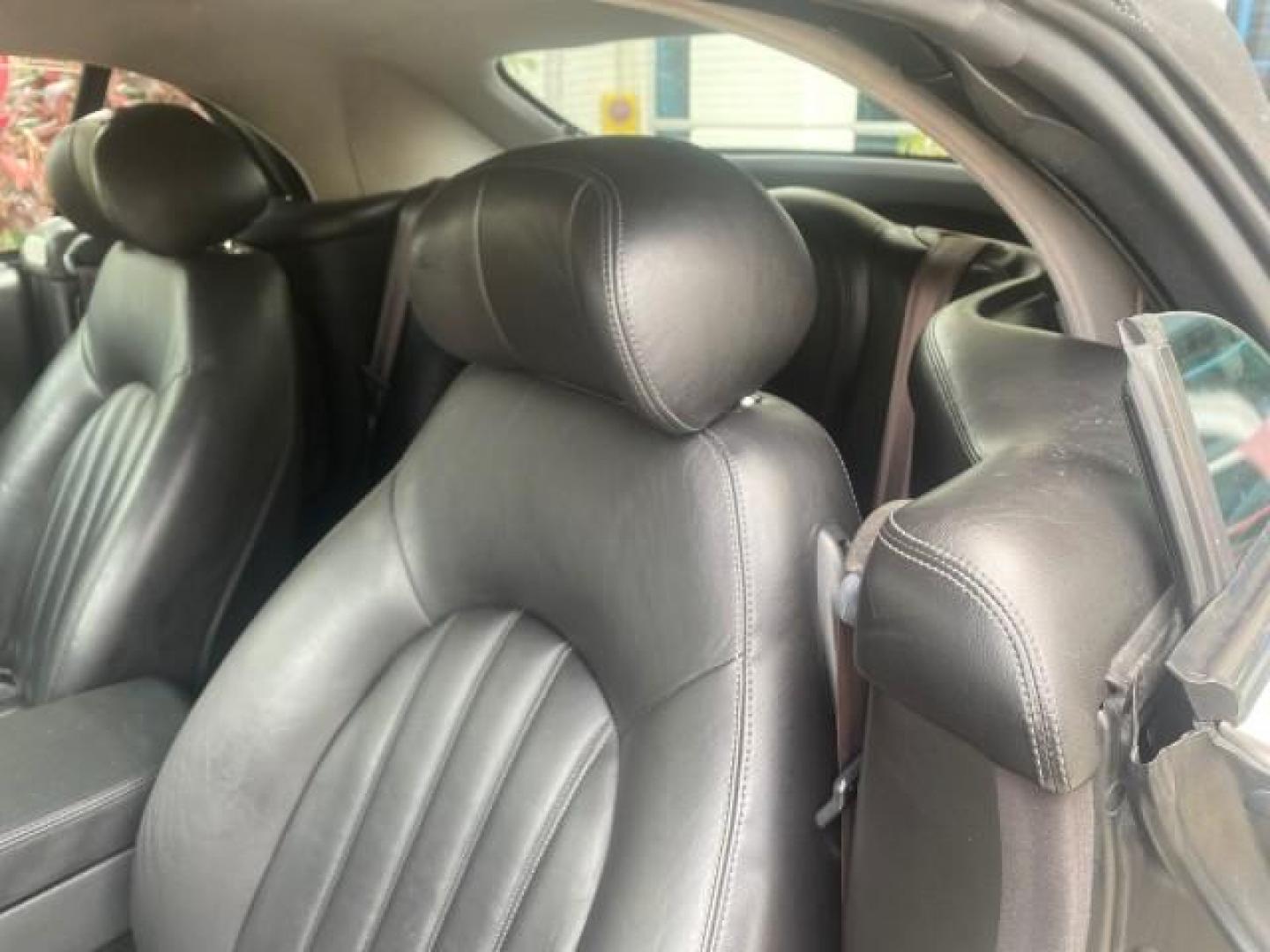 2004 Quartz /Charcoal Jaguar XK8 CONV LOW MILES 22,128 (SAJDA42CX42) with an 4.2L DOHC EFI 32-Valve Aluminum Alloy V8 Engine engine, Automatic transmission, located at 4701 North Dixie Hwy, Pompano Beach, FL, 33064, (954) 422-2889, 26.240938, -80.123474 - OUR WEBPAGE FLORIDACARS1.COM HAS OVER 100 PHOTOS AND FREE CARFAX LINK 2004 JAGUAR XK-SERIES XK8 $ 75,530 NEW VIN: SAJDA42CX42A37634 S A J D A 4 2 C X 4 2 A 3 7 6 3 4 CONVERTIBLE 4.2L V8 F DOHC GASOLINE REAR WHEEL DRIVE TOP WORKS GREAT! TIRES ARE LIKE NEW! Top Features Alloy Wheels Leather Seats Alpi - Photo#65