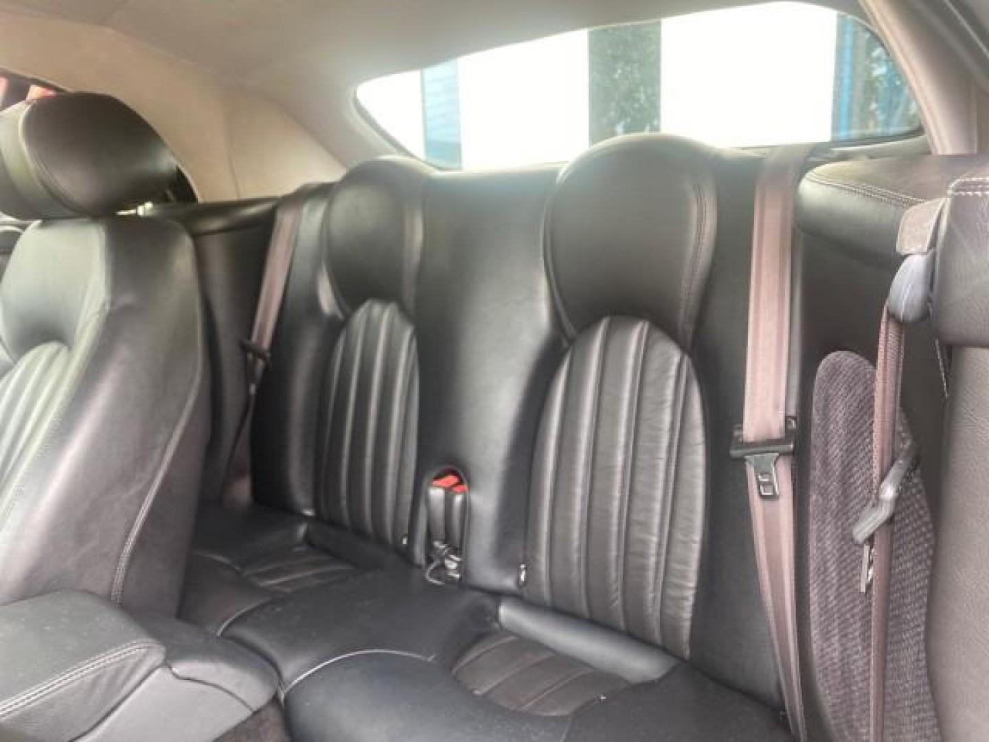 2004 Quartz /Charcoal Jaguar XK8 CONV LOW MILES 22,128 (SAJDA42CX42) with an 4.2L DOHC EFI 32-Valve Aluminum Alloy V8 Engine engine, Automatic transmission, located at 4701 North Dixie Hwy, Pompano Beach, FL, 33064, (954) 422-2889, 26.240938, -80.123474 - OUR WEBPAGE FLORIDACARS1.COM HAS OVER 100 PHOTOS AND FREE CARFAX LINK 2004 JAGUAR XK-SERIES XK8 $ 75,530 NEW VIN: SAJDA42CX42A37634 S A J D A 4 2 C X 4 2 A 3 7 6 3 4 CONVERTIBLE 4.2L V8 F DOHC GASOLINE REAR WHEEL DRIVE TOP WORKS GREAT! TIRES ARE LIKE NEW! Top Features Alloy Wheels Leather Seats Alpi - Photo#66