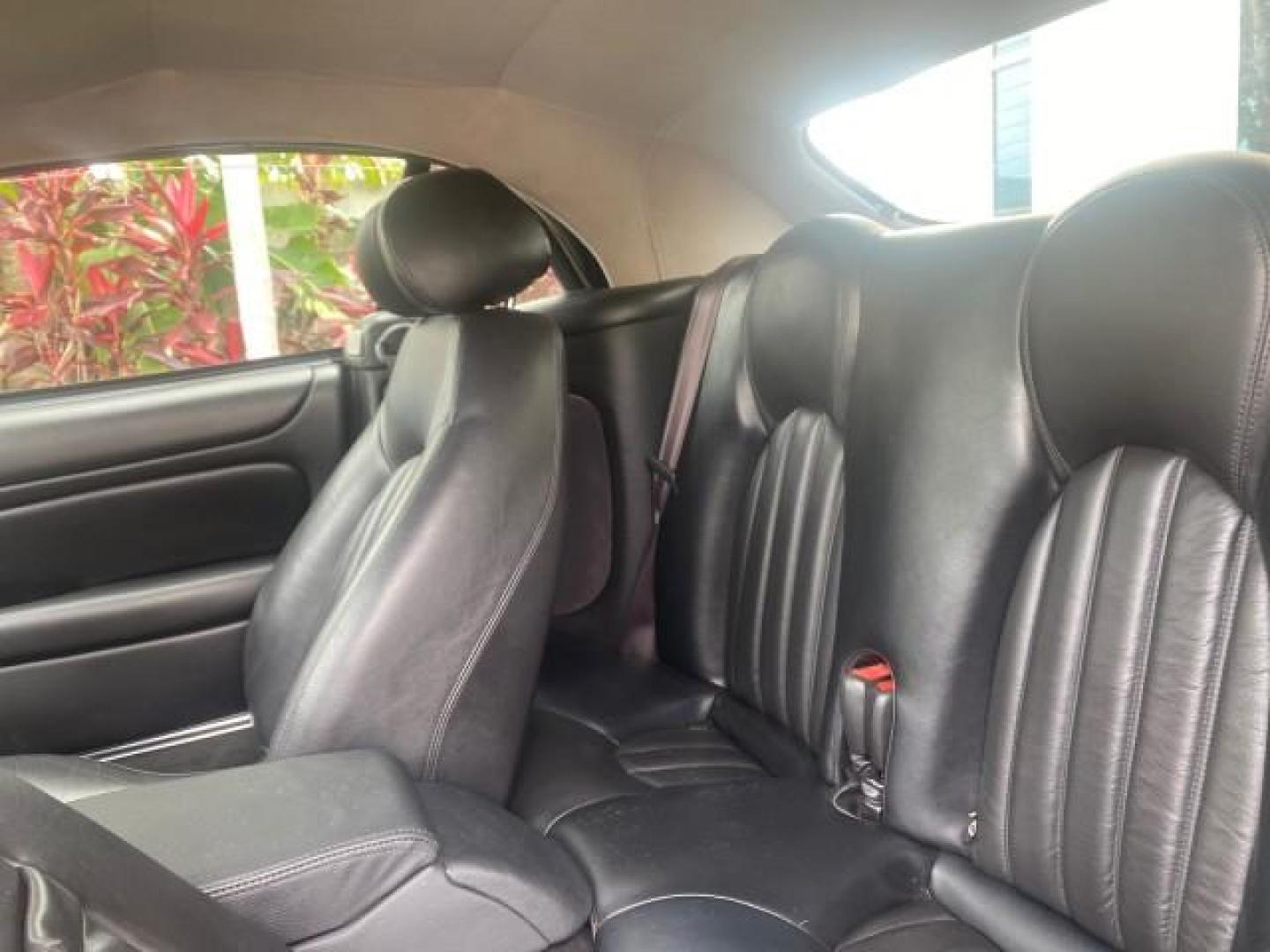 2004 Quartz /Charcoal Jaguar XK8 CONV LOW MILES 22,128 (SAJDA42CX42) with an 4.2L DOHC EFI 32-Valve Aluminum Alloy V8 Engine engine, Automatic transmission, located at 4701 North Dixie Hwy, Pompano Beach, FL, 33064, (954) 422-2889, 26.240938, -80.123474 - OUR WEBPAGE FLORIDACARS1.COM HAS OVER 100 PHOTOS AND FREE CARFAX LINK 2004 JAGUAR XK-SERIES XK8 $ 75,530 NEW VIN: SAJDA42CX42A37634 S A J D A 4 2 C X 4 2 A 3 7 6 3 4 CONVERTIBLE 4.2L V8 F DOHC GASOLINE REAR WHEEL DRIVE TOP WORKS GREAT! TIRES ARE LIKE NEW! Top Features Alloy Wheels Leather Seats Alpi - Photo#68