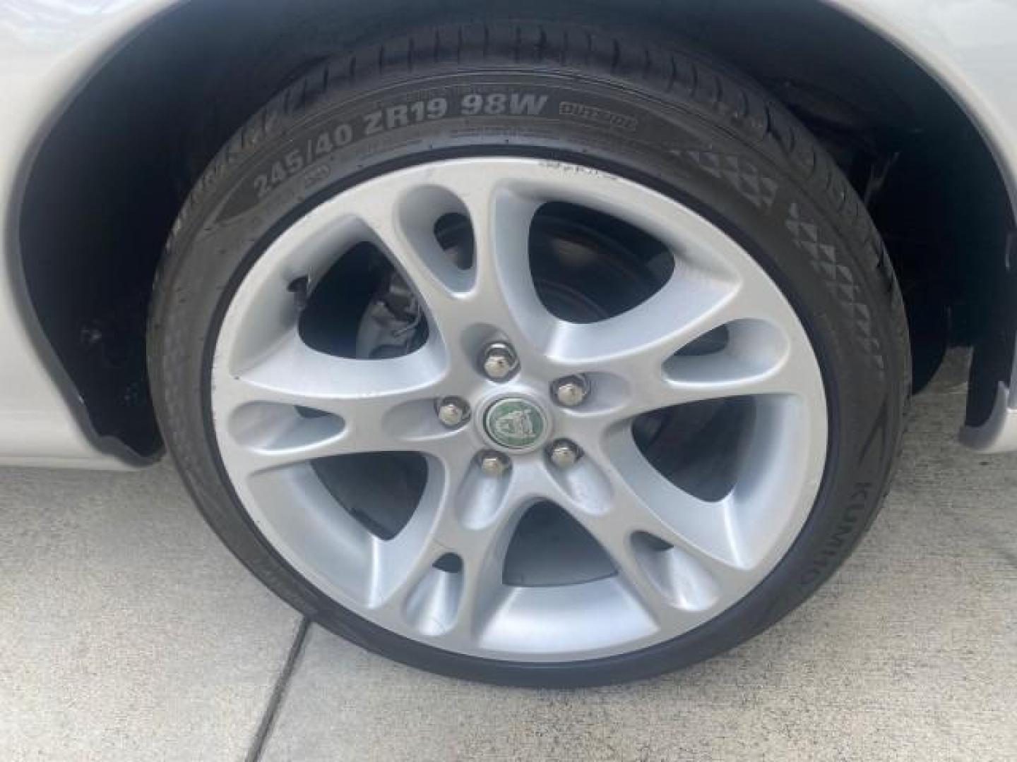 2004 Quartz /Charcoal Jaguar XK8 CONV LOW MILES 22,128 (SAJDA42CX42) with an 4.2L DOHC EFI 32-Valve Aluminum Alloy V8 Engine engine, Automatic transmission, located at 4701 North Dixie Hwy, Pompano Beach, FL, 33064, (954) 422-2889, 26.240938, -80.123474 - OUR WEBPAGE FLORIDACARS1.COM HAS OVER 100 PHOTOS AND FREE CARFAX LINK 2004 JAGUAR XK-SERIES XK8 $ 75,530 NEW VIN: SAJDA42CX42A37634 S A J D A 4 2 C X 4 2 A 3 7 6 3 4 CONVERTIBLE 4.2L V8 F DOHC GASOLINE REAR WHEEL DRIVE TOP WORKS GREAT! TIRES ARE LIKE NEW! Top Features Alloy Wheels Leather Seats Alpi - Photo#69