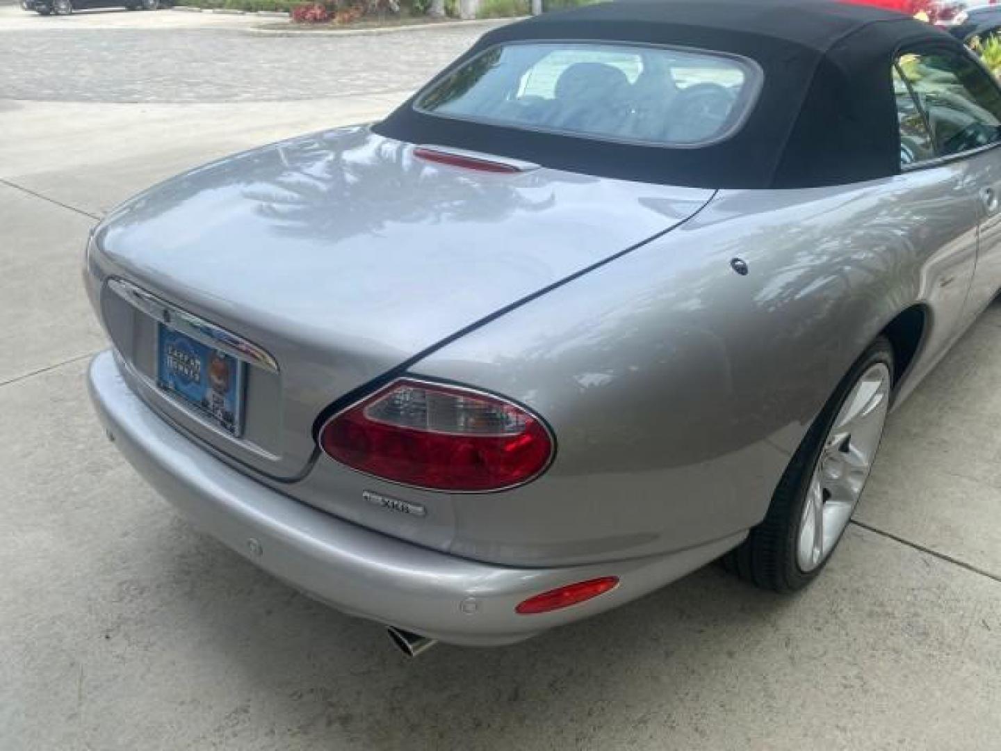 2004 Quartz /Charcoal Jaguar XK8 CONV LOW MILES 22,128 (SAJDA42CX42) with an 4.2L DOHC EFI 32-Valve Aluminum Alloy V8 Engine engine, Automatic transmission, located at 4701 North Dixie Hwy, Pompano Beach, FL, 33064, (954) 422-2889, 26.240938, -80.123474 - OUR WEBPAGE FLORIDACARS1.COM HAS OVER 100 PHOTOS AND FREE CARFAX LINK 2004 JAGUAR XK-SERIES XK8 $ 75,530 NEW VIN: SAJDA42CX42A37634 S A J D A 4 2 C X 4 2 A 3 7 6 3 4 CONVERTIBLE 4.2L V8 F DOHC GASOLINE REAR WHEEL DRIVE TOP WORKS GREAT! TIRES ARE LIKE NEW! Top Features Alloy Wheels Leather Seats Alpi - Photo#75