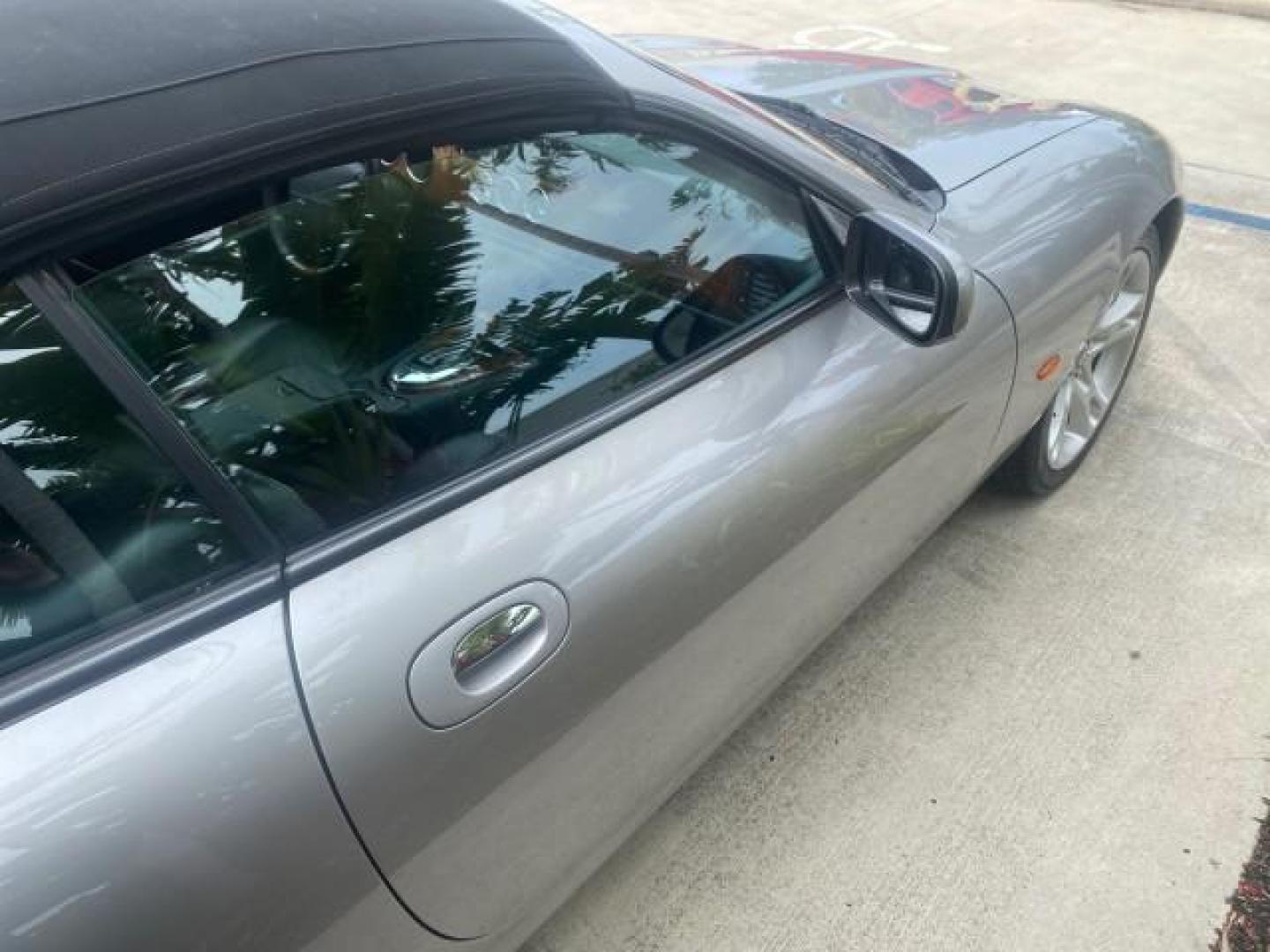 2004 Quartz /Charcoal Jaguar XK8 CONV LOW MILES 22,128 (SAJDA42CX42) with an 4.2L DOHC EFI 32-Valve Aluminum Alloy V8 Engine engine, Automatic transmission, located at 4701 North Dixie Hwy, Pompano Beach, FL, 33064, (954) 422-2889, 26.240938, -80.123474 - OUR WEBPAGE FLORIDACARS1.COM HAS OVER 100 PHOTOS AND FREE CARFAX LINK 2004 JAGUAR XK-SERIES XK8 $ 75,530 NEW VIN: SAJDA42CX42A37634 S A J D A 4 2 C X 4 2 A 3 7 6 3 4 CONVERTIBLE 4.2L V8 F DOHC GASOLINE REAR WHEEL DRIVE TOP WORKS GREAT! TIRES ARE LIKE NEW! Top Features Alloy Wheels Leather Seats Alpi - Photo#87