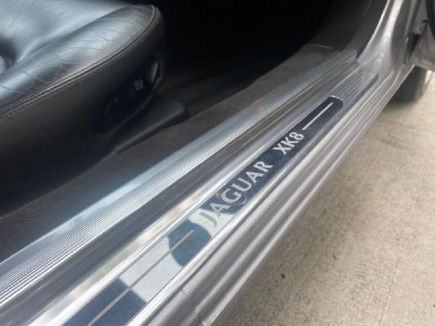 2004 Quartz /Charcoal Jaguar XK8 CONV LOW MILES 22,128 (SAJDA42CX42) with an 4.2L DOHC EFI 32-Valve Aluminum Alloy V8 Engine engine, Automatic transmission, located at 4701 North Dixie Hwy, Pompano Beach, FL, 33064, (954) 422-2889, 26.240938, -80.123474 - OUR WEBPAGE FLORIDACARS1.COM HAS OVER 100 PHOTOS AND FREE CARFAX LINK 2004 JAGUAR XK-SERIES XK8 $ 75,530 NEW VIN: SAJDA42CX42A37634 S A J D A 4 2 C X 4 2 A 3 7 6 3 4 CONVERTIBLE 4.2L V8 F DOHC GASOLINE REAR WHEEL DRIVE TOP WORKS GREAT! TIRES ARE LIKE NEW! Top Features Alloy Wheels Leather Seats Alpi - Photo#92