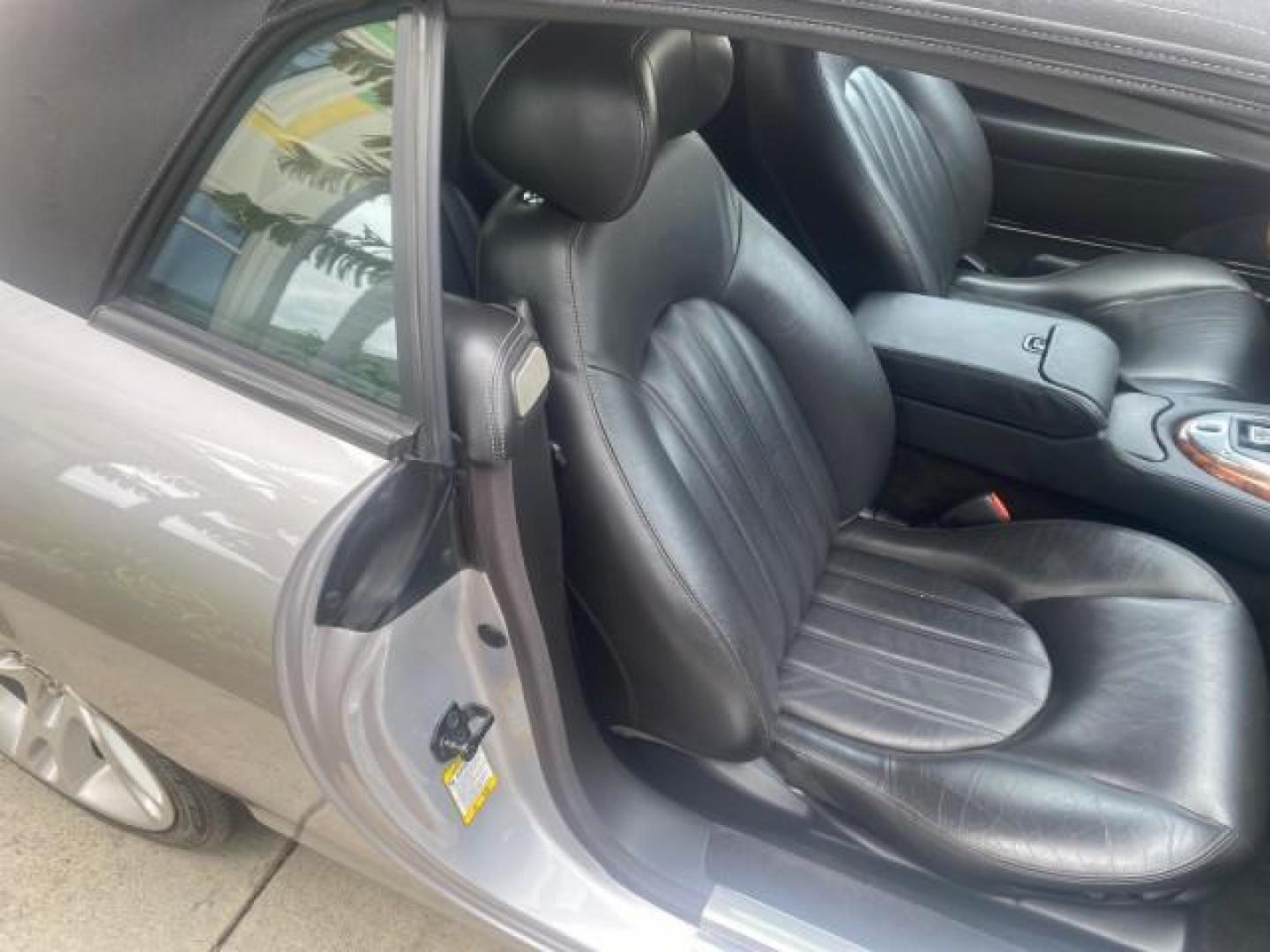 2004 Quartz /Charcoal Jaguar XK8 CONV LOW MILES 22,128 (SAJDA42CX42) with an 4.2L DOHC EFI 32-Valve Aluminum Alloy V8 Engine engine, Automatic transmission, located at 4701 North Dixie Hwy, Pompano Beach, FL, 33064, (954) 422-2889, 26.240938, -80.123474 - OUR WEBPAGE FLORIDACARS1.COM HAS OVER 100 PHOTOS AND FREE CARFAX LINK 2004 JAGUAR XK-SERIES XK8 $ 75,530 NEW VIN: SAJDA42CX42A37634 S A J D A 4 2 C X 4 2 A 3 7 6 3 4 CONVERTIBLE 4.2L V8 F DOHC GASOLINE REAR WHEEL DRIVE TOP WORKS GREAT! TIRES ARE LIKE NEW! Top Features Alloy Wheels Leather Seats Alpi - Photo#96