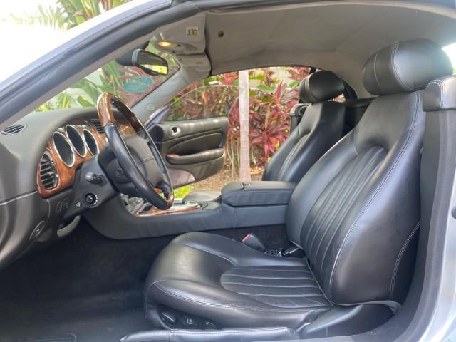 2004 Quartz /Charcoal Jaguar XK8 CONV LOW MILES 22,152 (SAJDA42CX42) with an 4.2L DOHC EFI 32-Valve Aluminum Alloy V8 Engine engine, Automatic transmission, located at 4701 North Dixie Hwy, Pompano Beach, FL, 33064, (954) 422-2889, 26.240938, -80.123474 - OUR WEBPAGE FLORIDACARS1.COM HAS OVER 100 PHOTOS AND FREE CARFAX LINK 2004 JAGUAR XK-SERIES XK8 $ 75,530 NEW VIN: SAJDA42CX42A37634 S A J D A 4 2 C X 4 2 A 3 7 6 3 4 CONVERTIBLE 4.2L V8 F DOHC GASOLINE REAR WHEEL DRIVE TOP WORKS GREAT! TIRES ARE LIKE NEW! Top Features Alloy Wheels Leather Seats Alpi - Photo#10