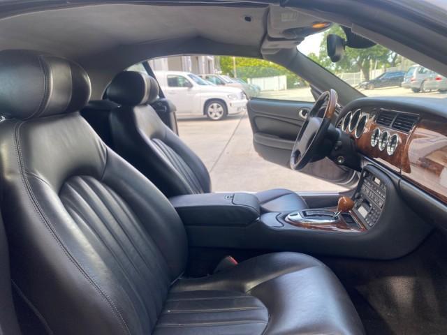 2004 Quartz /Charcoal Jaguar XK8 CONV LOW MILES 22,152 (SAJDA42CX42) with an 4.2L DOHC EFI 32-Valve Aluminum Alloy V8 Engine engine, Automatic transmission, located at 4701 North Dixie Hwy, Pompano Beach, FL, 33064, (954) 422-2889, 26.240938, -80.123474 - OUR WEBPAGE FLORIDACARS1.COM HAS OVER 100 PHOTOS AND FREE CARFAX LINK 2004 JAGUAR XK-SERIES XK8 $ 75,530 NEW VIN: SAJDA42CX42A37634 S A J D A 4 2 C X 4 2 A 3 7 6 3 4 CONVERTIBLE 4.2L V8 F DOHC GASOLINE REAR WHEEL DRIVE TOP WORKS GREAT! TIRES ARE LIKE NEW! Top Features Alloy Wheels Leather Seats Alpi - Photo#12