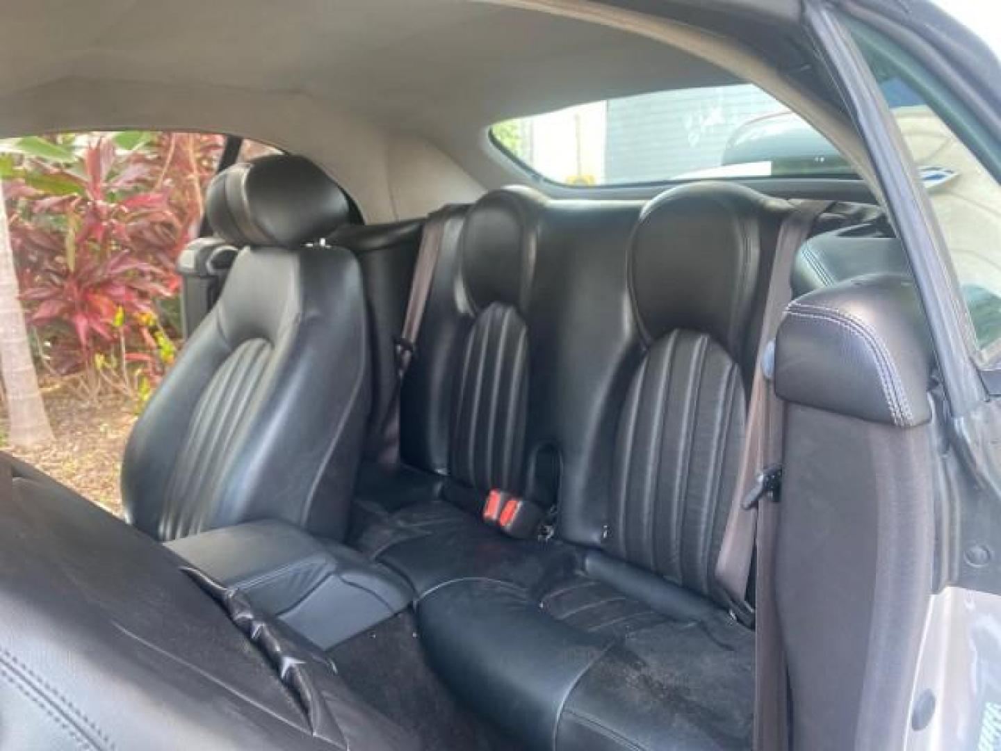 2004 Quartz /Charcoal Jaguar XK8 XK8 CONV LOW MILES 22,152 (SAJDA42CX42) with an 4.2L DOHC EFI 32-Valve Aluminum Alloy V8 Engine engine, Automatic transmission, located at 4701 North Dixie Hwy, Pompano Beach, FL, 33064, (954) 422-2889, 26.240938, -80.123474 - OUR WEBPAGE FLORIDACARS1.COM HAS OVER 100 PHOTOS AND FREE CARFAX LINK 2004 JAGUAR XK-SERIES XK8 $ 75,530 NEW VIN: SAJDA42CX42A37634 S A J D A 4 2 C X 4 2 A 3 7 6 3 4 CONVERTIBLE 4.2L V8 F DOHC GASOLINE REAR WHEEL DRIVE TOP WORKS GREAT! TIRES ARE LIKE NEW! Top Features Alloy Wheels Leather Seats Alpi - Photo#14