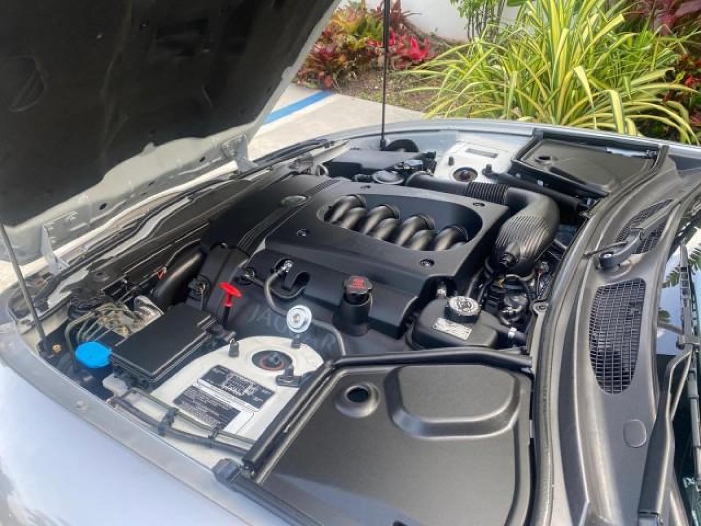 2004 Quartz /Charcoal Jaguar XK8 XK8 CONV LOW MILES 22,152 (SAJDA42CX42) with an 4.2L DOHC EFI 32-Valve Aluminum Alloy V8 Engine engine, Automatic transmission, located at 4701 North Dixie Hwy, Pompano Beach, FL, 33064, (954) 422-2889, 26.240938, -80.123474 - OUR WEBPAGE FLORIDACARS1.COM HAS OVER 100 PHOTOS AND FREE CARFAX LINK 2004 JAGUAR XK-SERIES XK8 $ 75,530 NEW VIN: SAJDA42CX42A37634 S A J D A 4 2 C X 4 2 A 3 7 6 3 4 CONVERTIBLE 4.2L V8 F DOHC GASOLINE REAR WHEEL DRIVE TOP WORKS GREAT! TIRES ARE LIKE NEW! Top Features Alloy Wheels Leather Seats Alpi - Photo#24